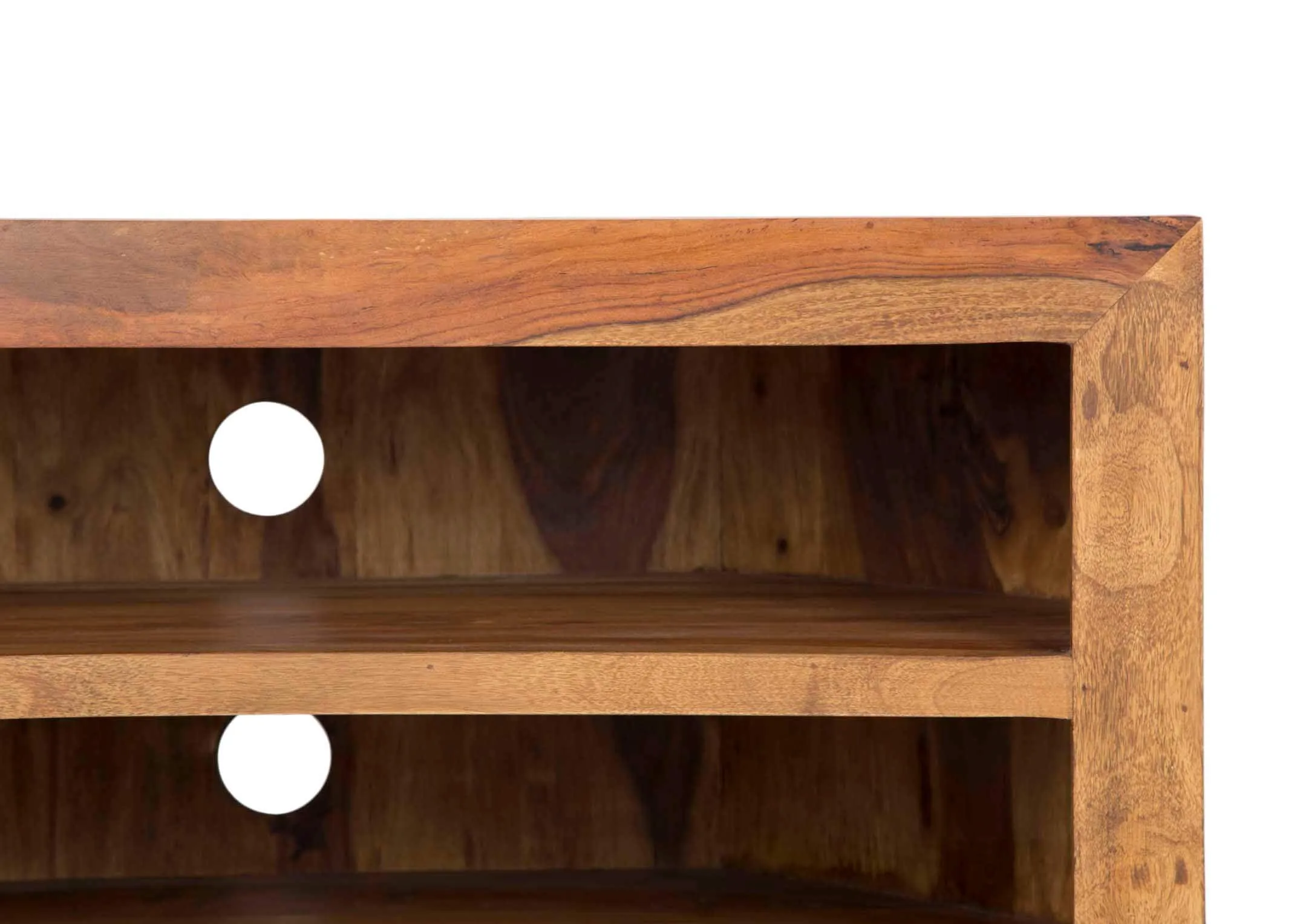 A lifestyle image of the India TV Unit with tv & Tarac baskets