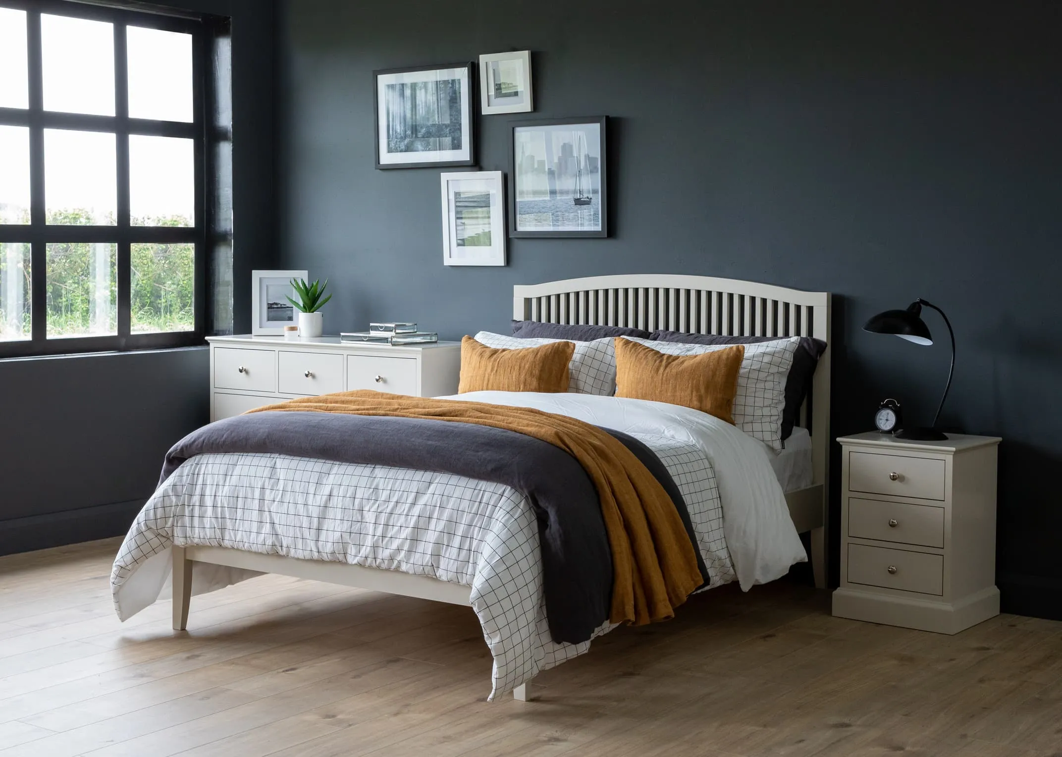 A lifestyle image of the grey 5ft rivendale bed with Chest & locker from EZ Living Furniture