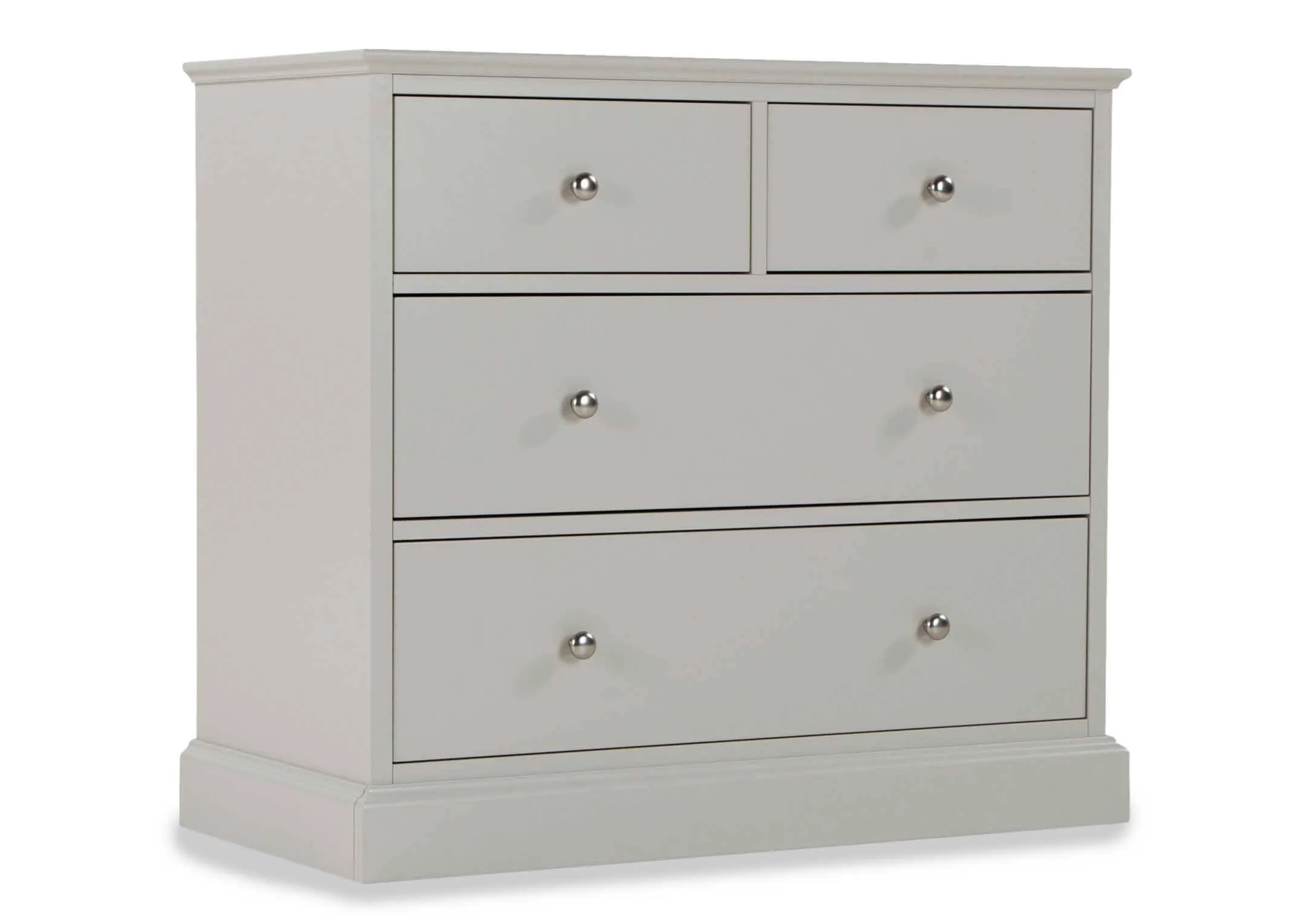 Angle shot of the Rivendale two over two grey chest of drawers with circular metal handles and subtle detailing