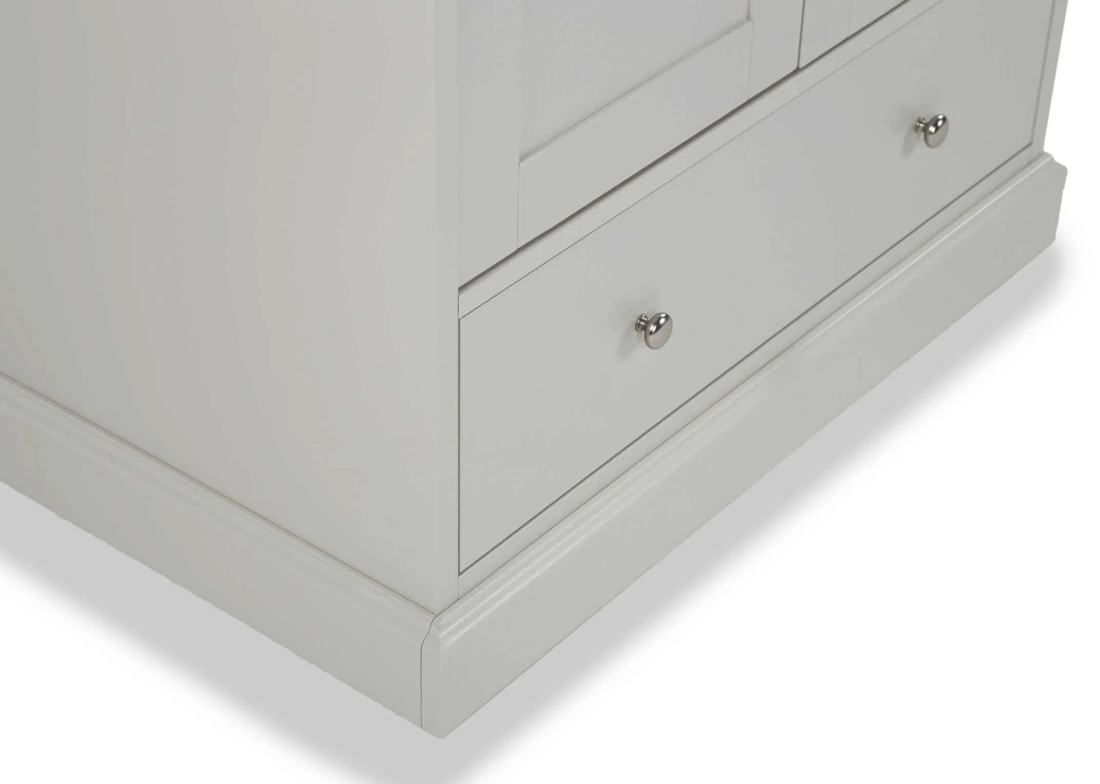 Detailed close-up view of the Rivendale wardrobe showing the drawer painted white and featuring two metal handles