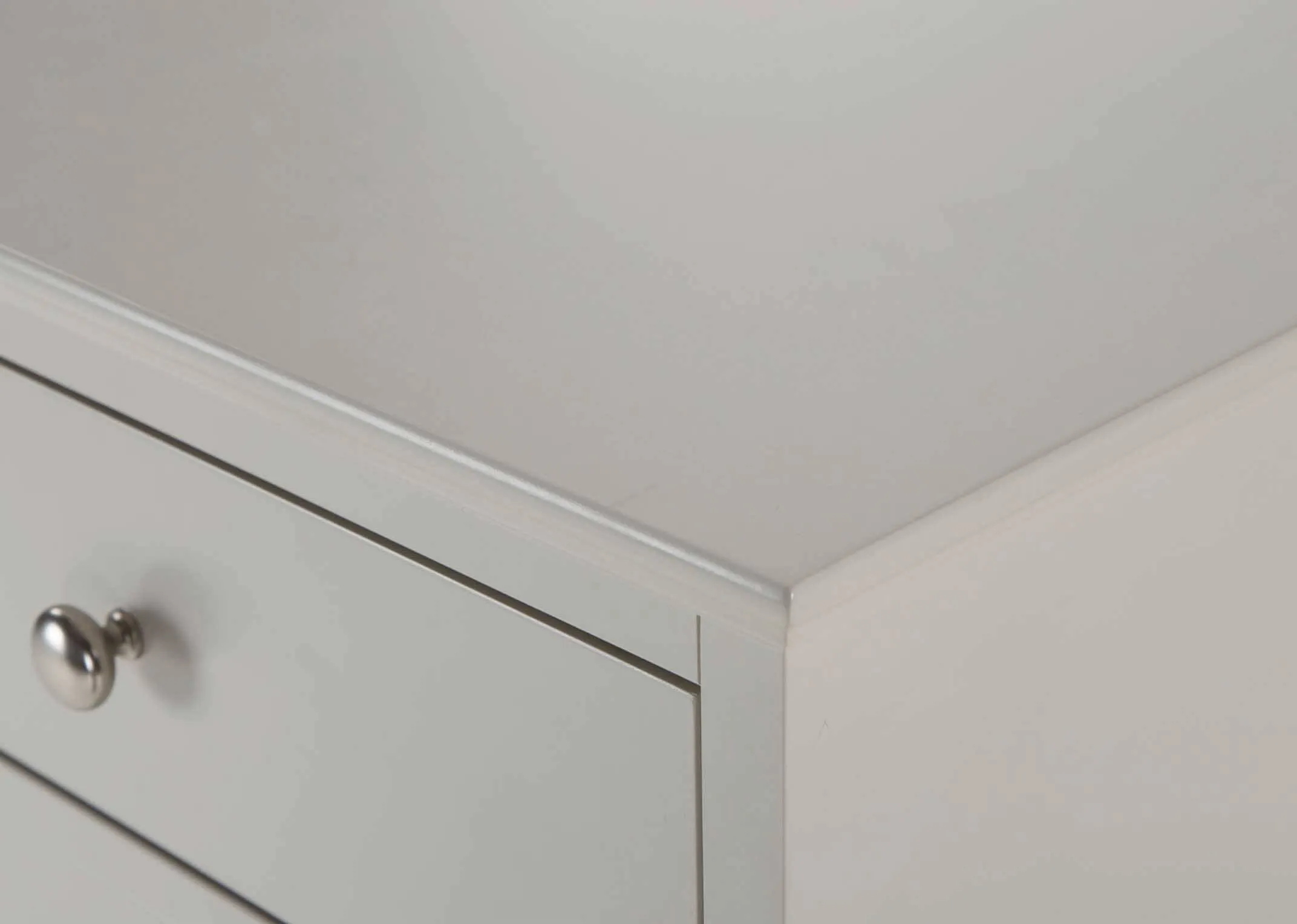 A lifestyle image of the grey 5ft rivendale bed with large Chest & locker from EZ Living Furniture