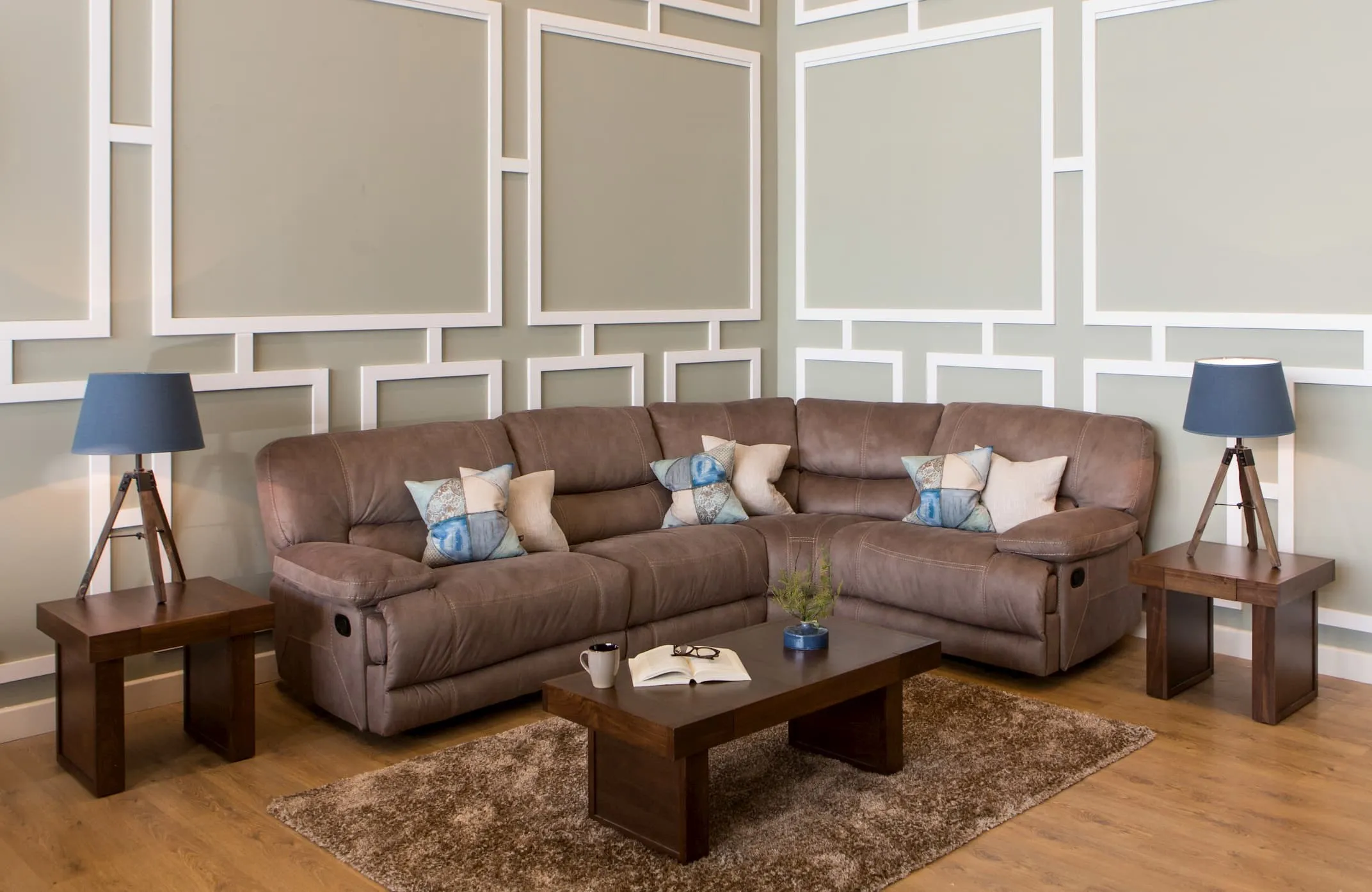 The complete Baxter corner sofa including the taupe armless sofa in a lifestyle image
