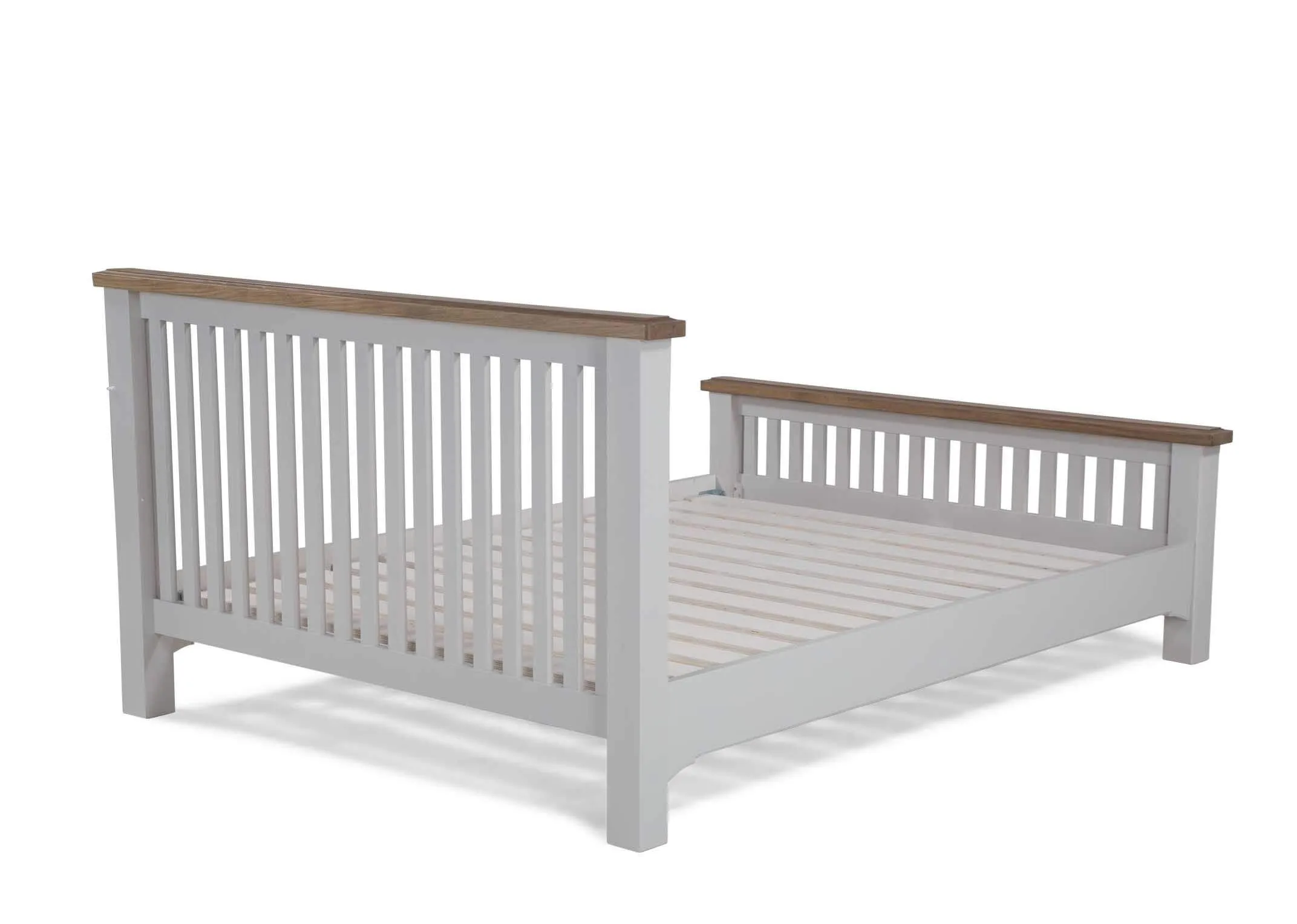 Side view of double 4 feet 6 inch grey oak bed frame with light brown ending Georgia