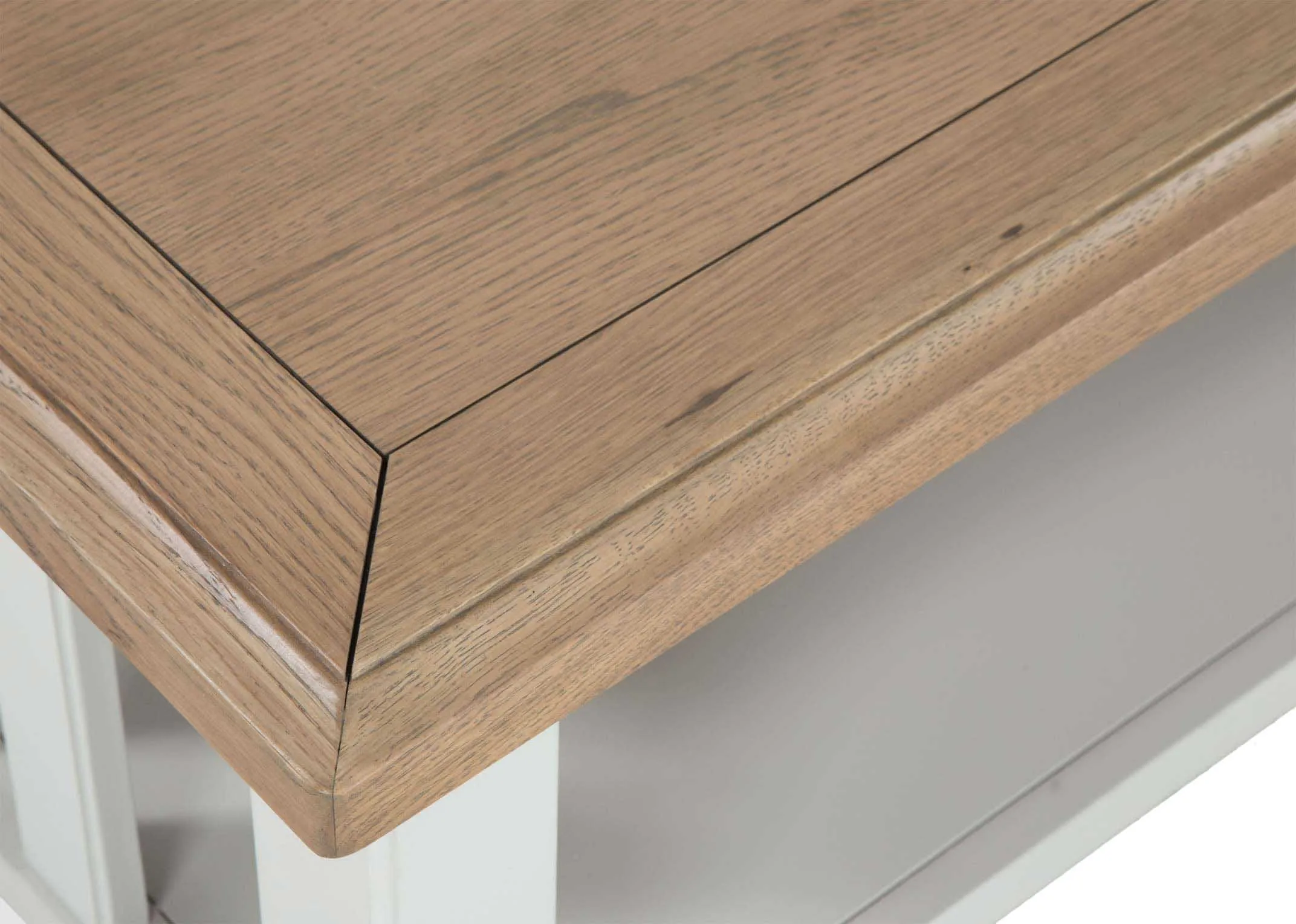 A close up image looking down at the corner of the top of the Georgia grey oak coffee table.