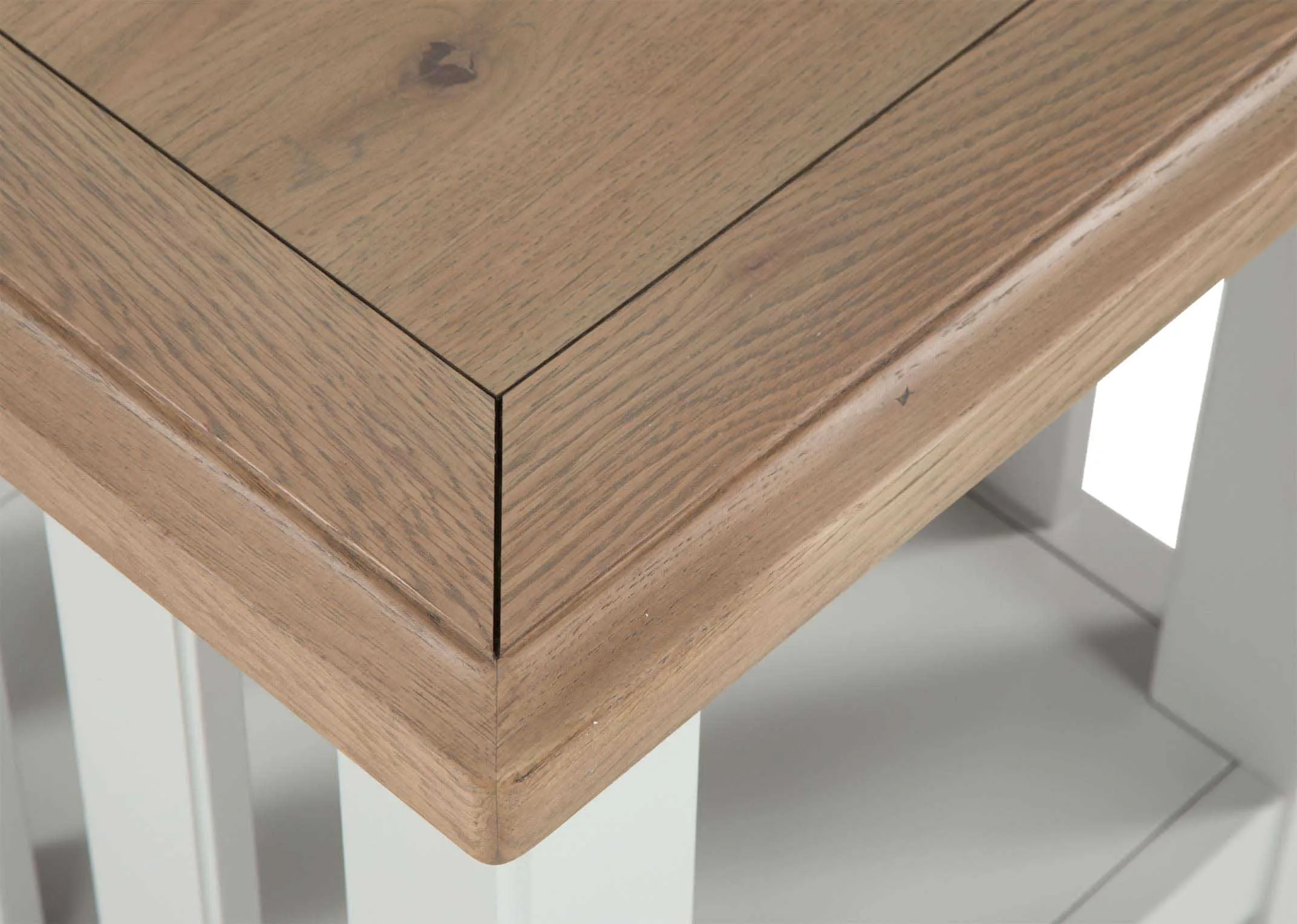 A close up view looking down onto the natural finish top of the grey solid oak Georgia lamp table with bottom shelf.