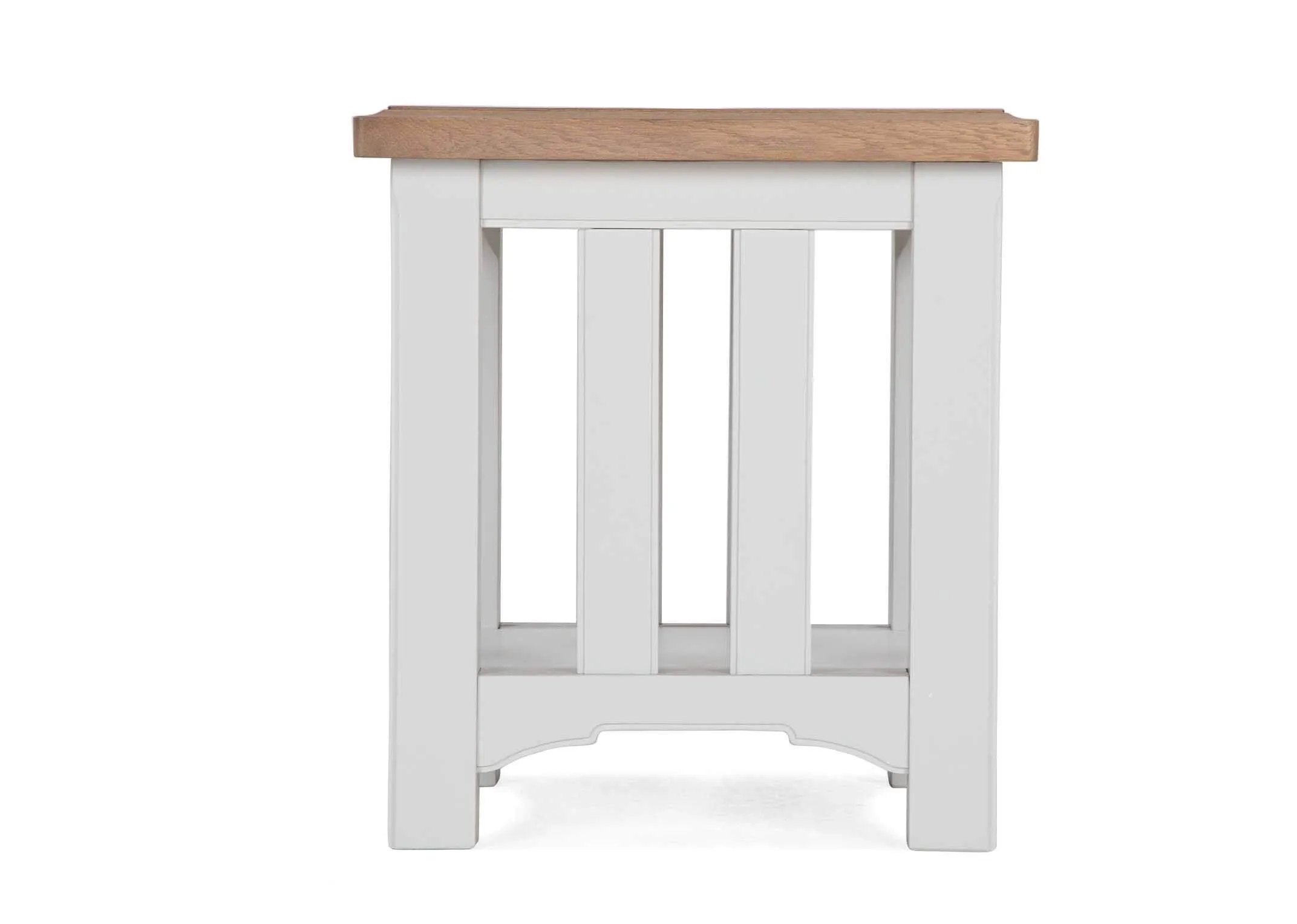 A view from the sise of the grey solid oak Georgia lamp table with bottom shelf.