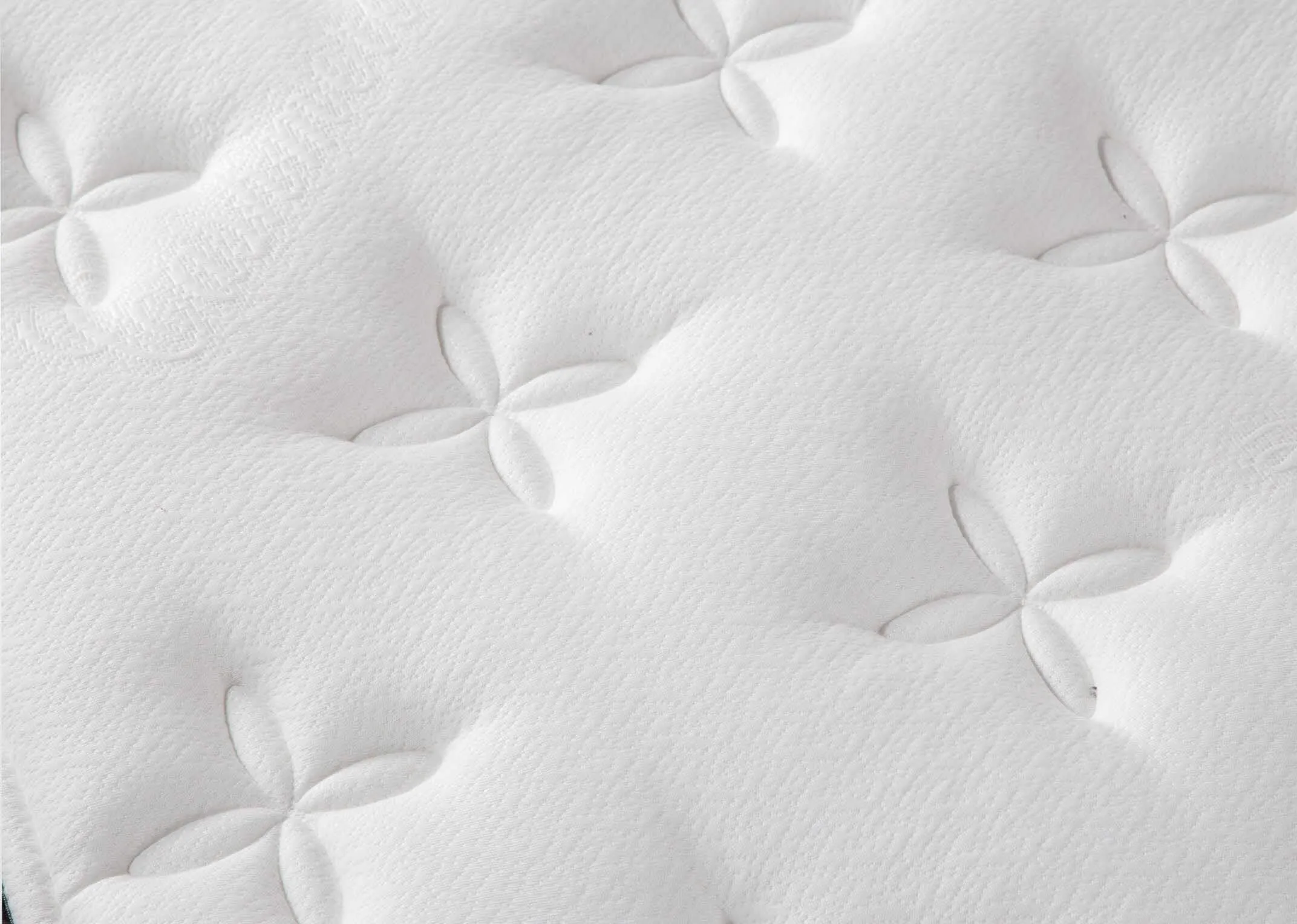 A lifestyle image of the 5 feet king size white Cashmere mattress with Venice base & chevron locker and chest.