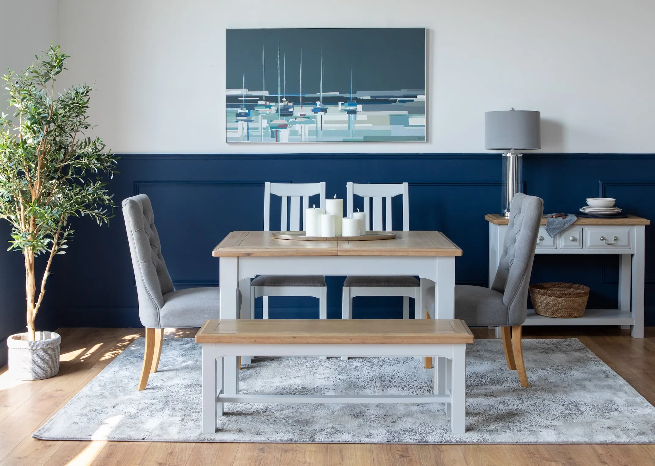 A lifestyle image of the Georgia Rectangular small table with console & Clara Dining Chairs.