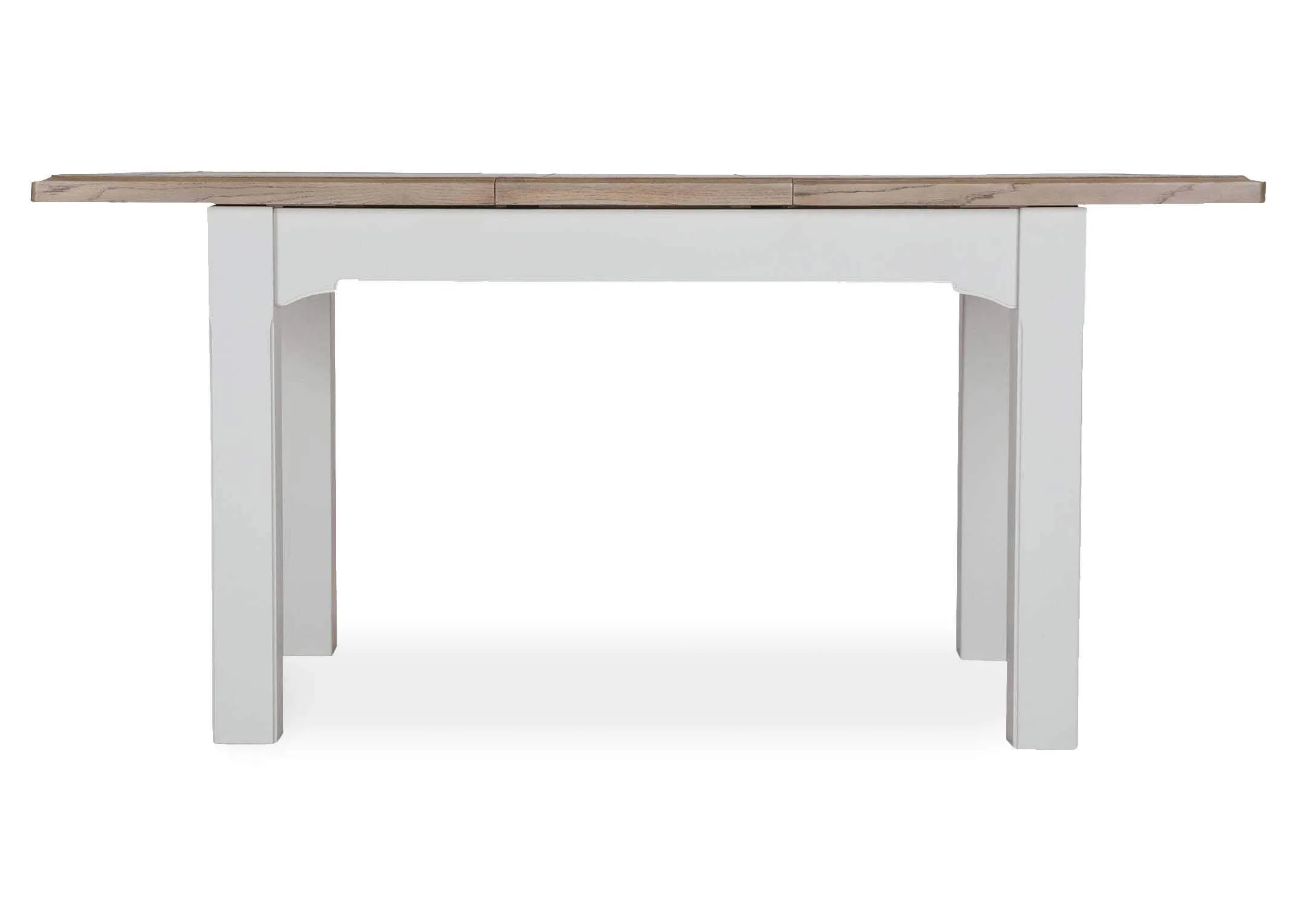 View from front of extendable solid oak Georgia dining table with leaves extended