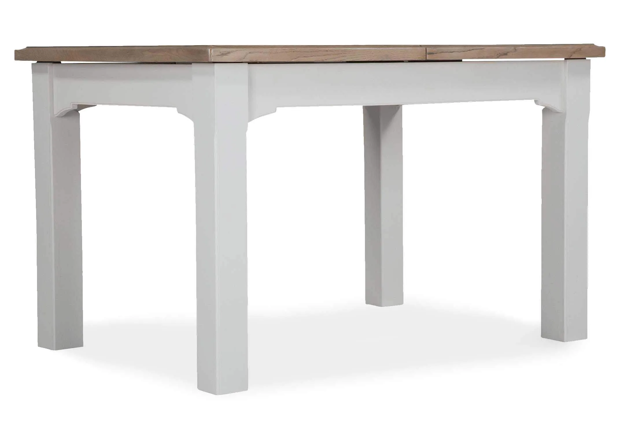View from front side-angle of the front of the dual coloured solid oak Georgia dining table
