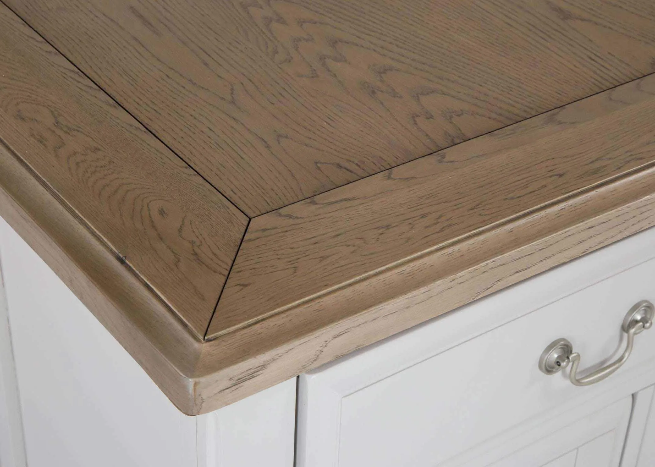 View of top corner of the two drawer three door grey oak large Georgia sideboard