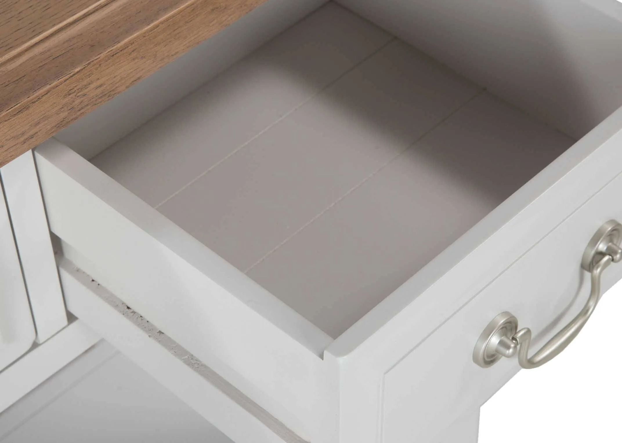 A close up from above looking down on the natural finish top of solid oak 3 drawer Georgia console table.