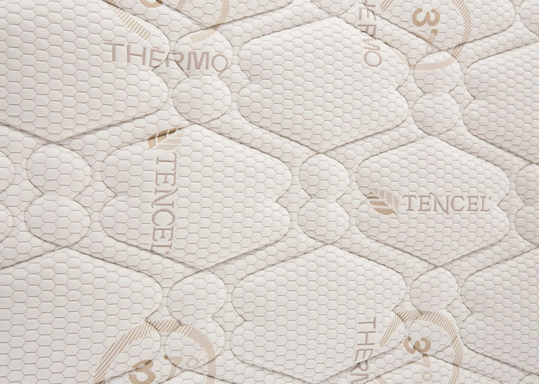 A 4ft 6 pocket spring white mattress from EZ Living's Odearest range.Closeup of thermo print on fabric