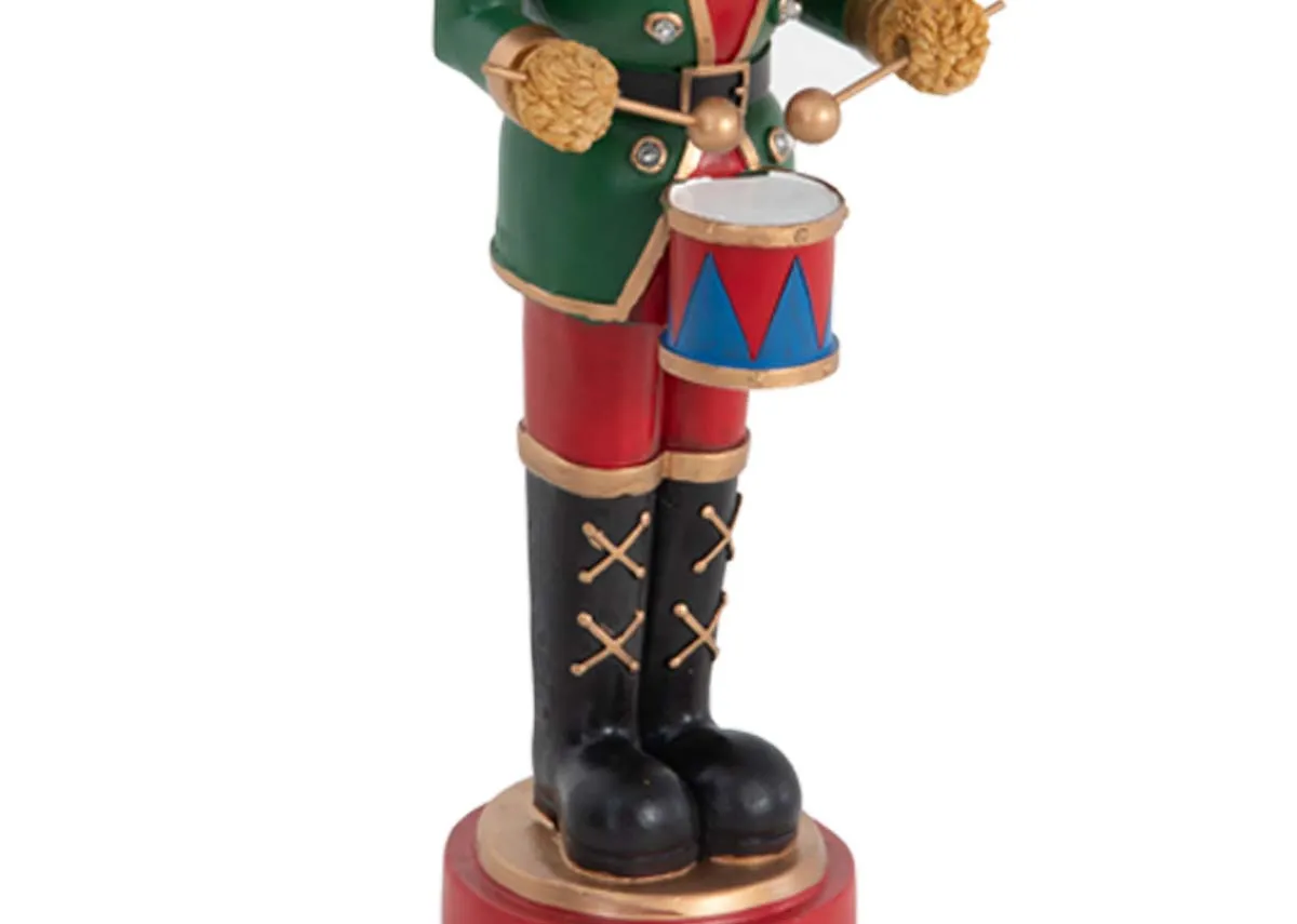 A dimension image of the Teddy Nutcracker with drum with 15cm x 46cm