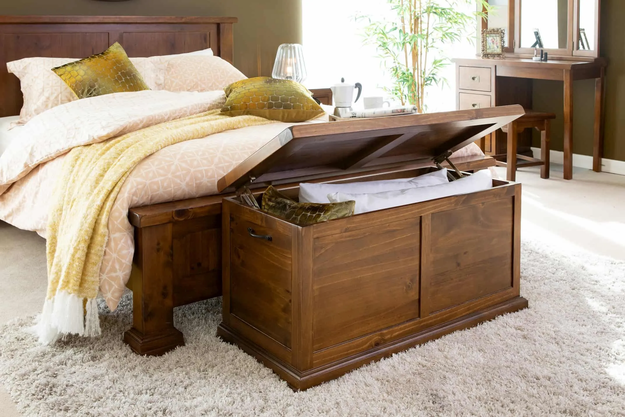 A lifestyle image for the Aisling Large blanket box open with the matching bedroom range at EZ Living Furniture.