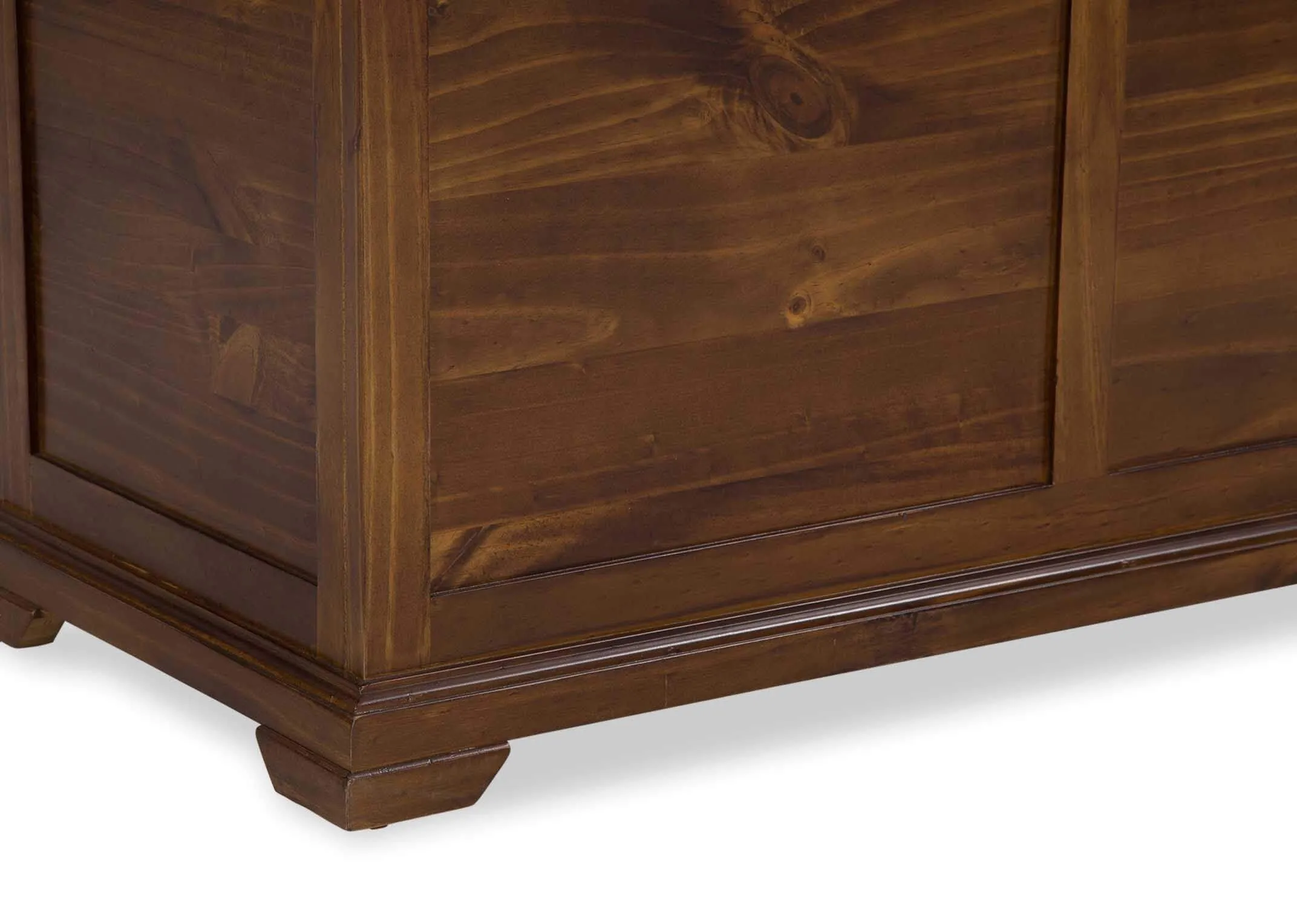 A lifestyle image of the Aisling Blanket box at the foot of the bedframe with matching furniture.