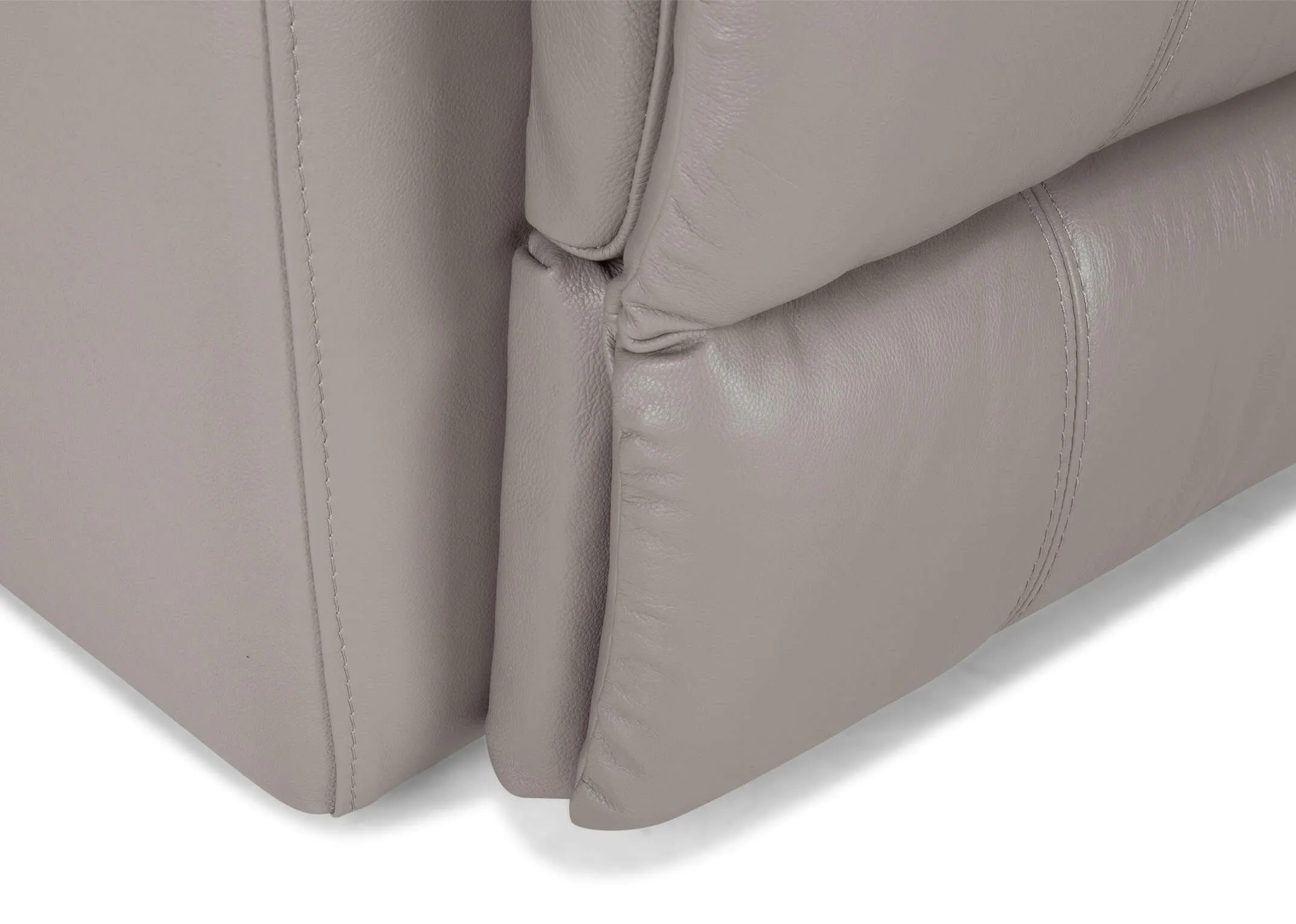 Detailed close-up view of the Groove power reclining armchair showing the bottom corner