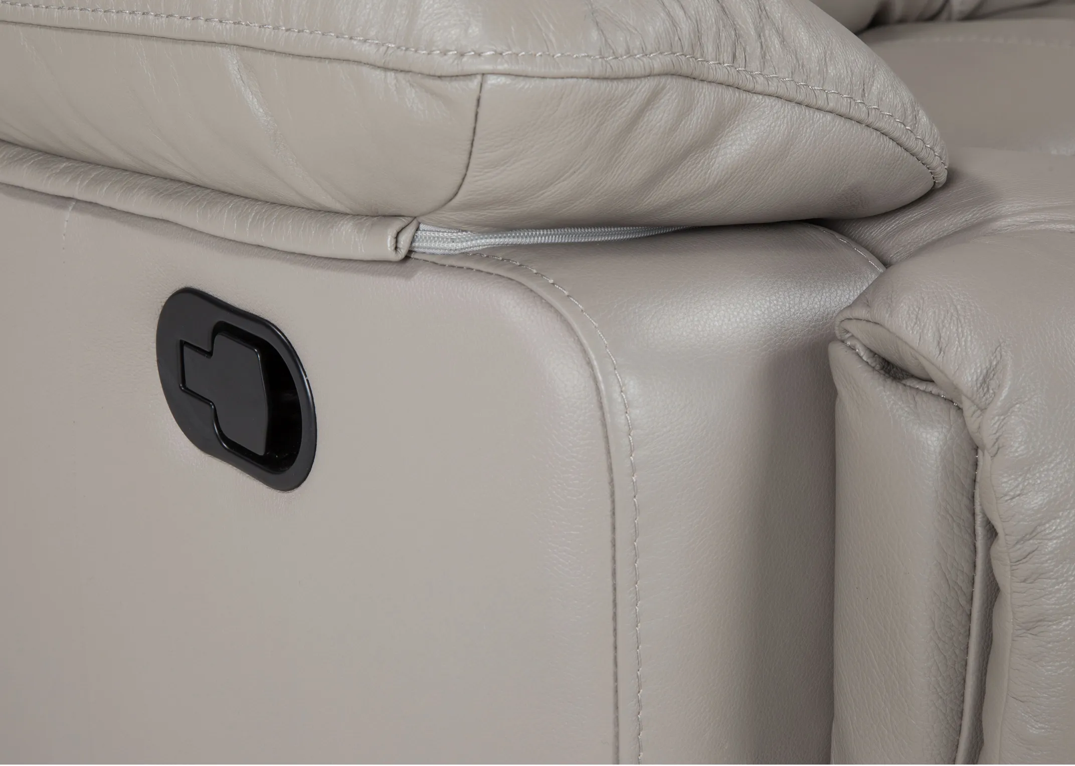 A grey leather power recliner from EZ Living Furnitures Groove range. Closeup of power reclining button