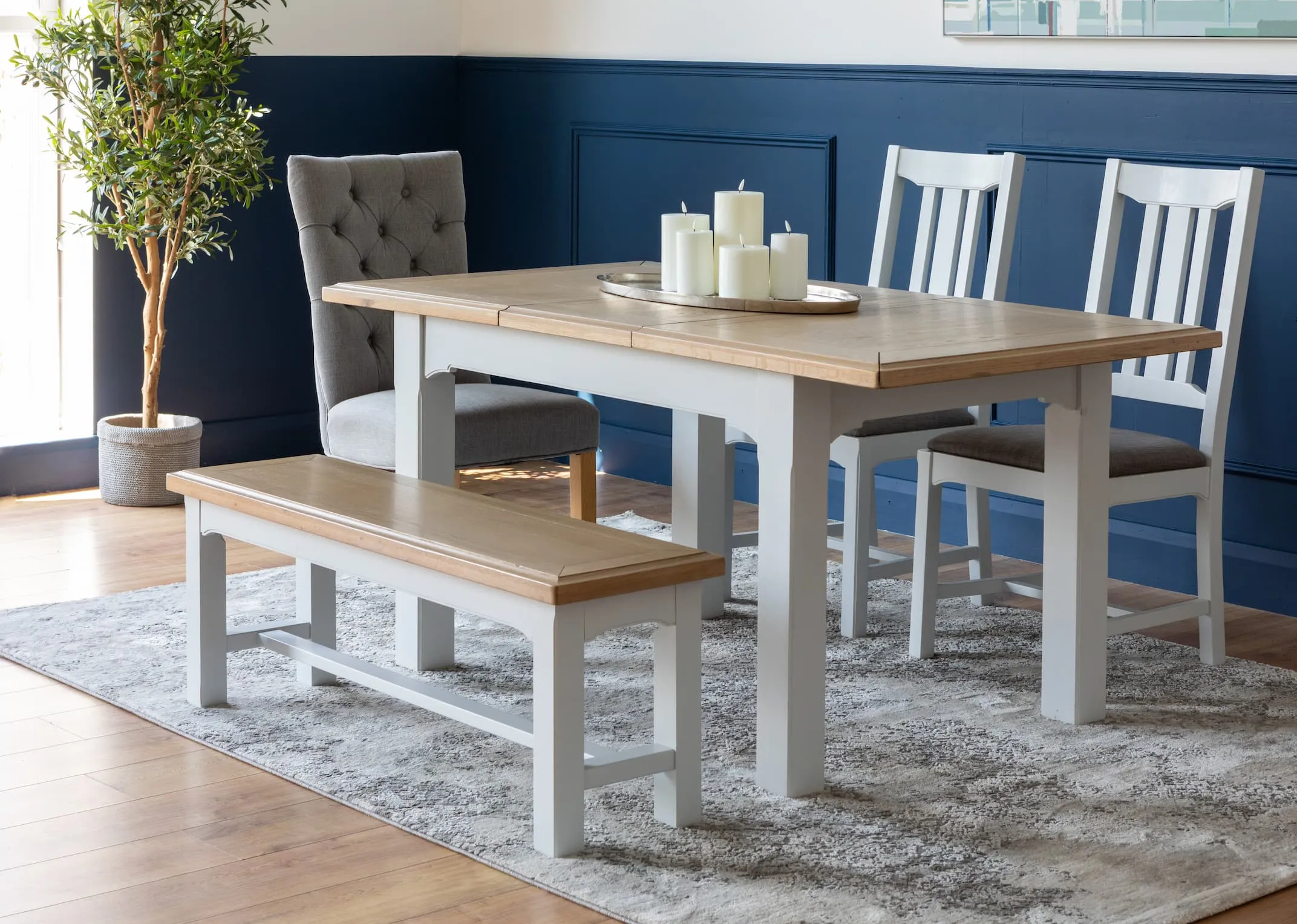 A lifestyle image of the Georgia Rectangular table with bench & chairs & Clara Dining Chairs.