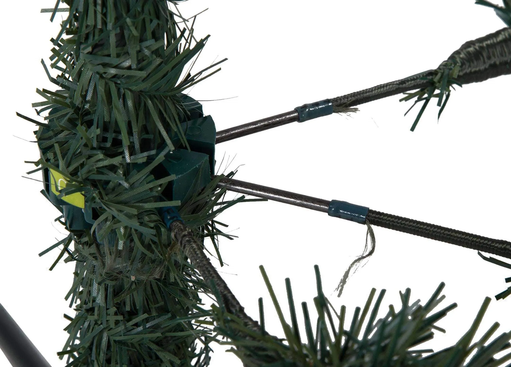 A close up of the place whre the branches meet the center of the 6ft Pine Christmas Tree.