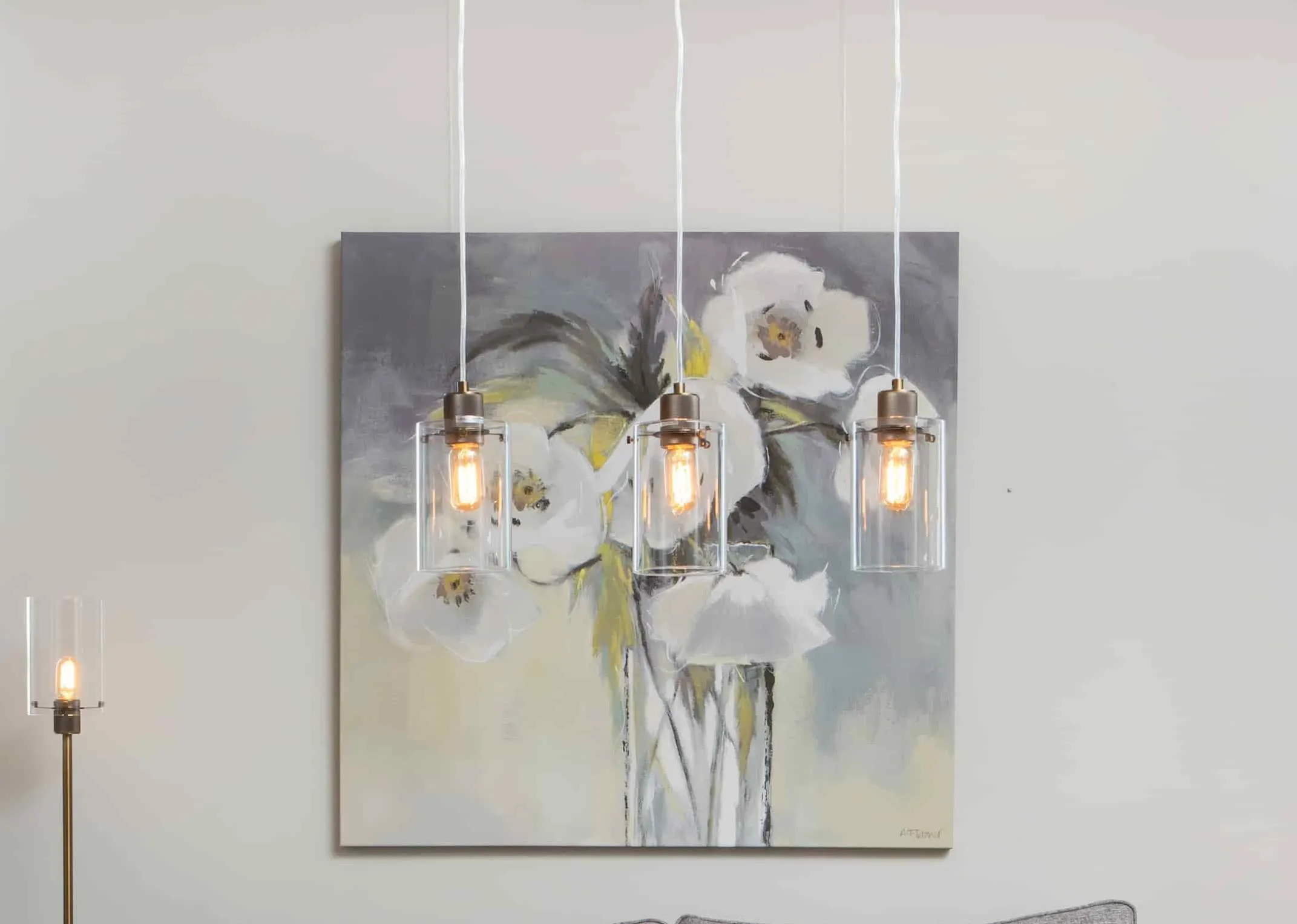 A lifestyle image of the Norton Ceiling light with the Leanne floor lamp & Helix canvas print
