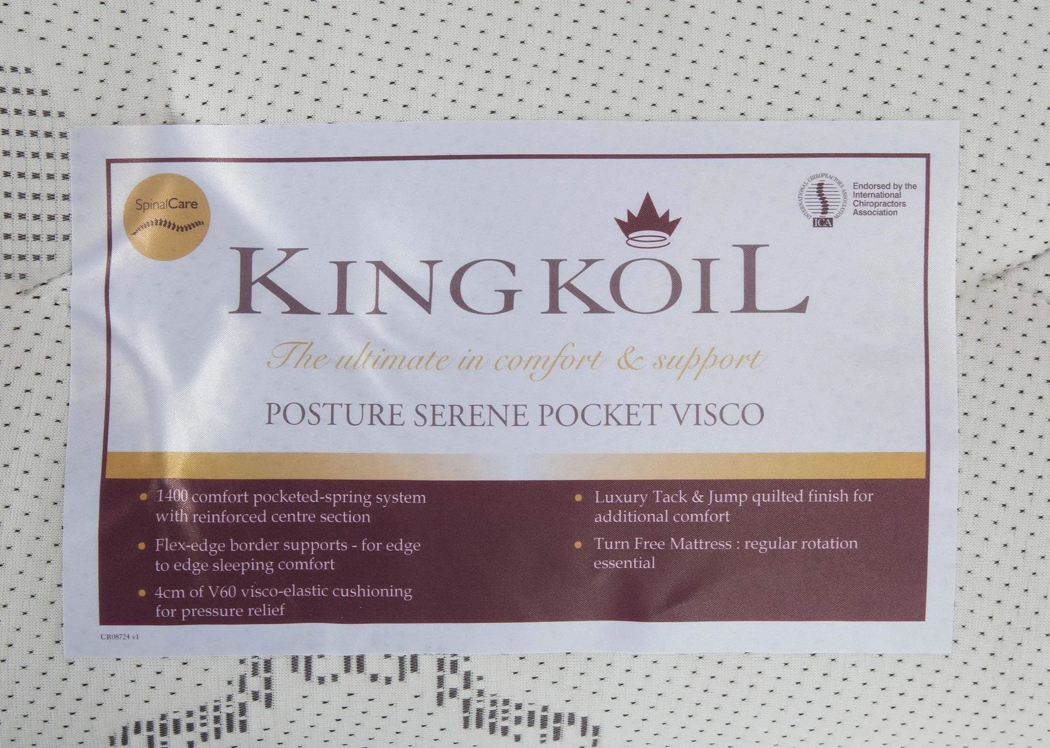 Detailed close-up view of the Posture Serene king size 5 ft Pocket Visco showing the King Koil label