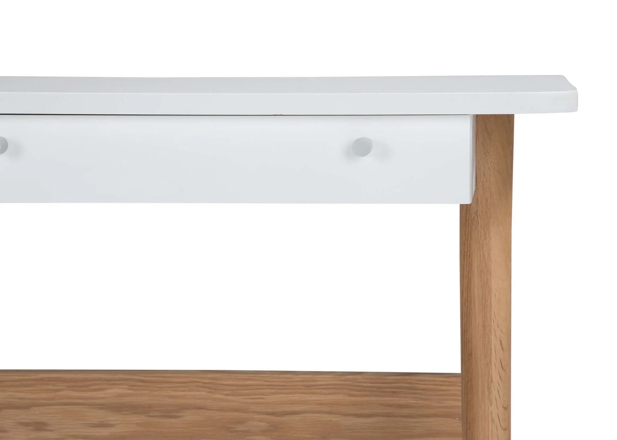 A close up view showing the drawer and the top right corner of the white top Tia desk