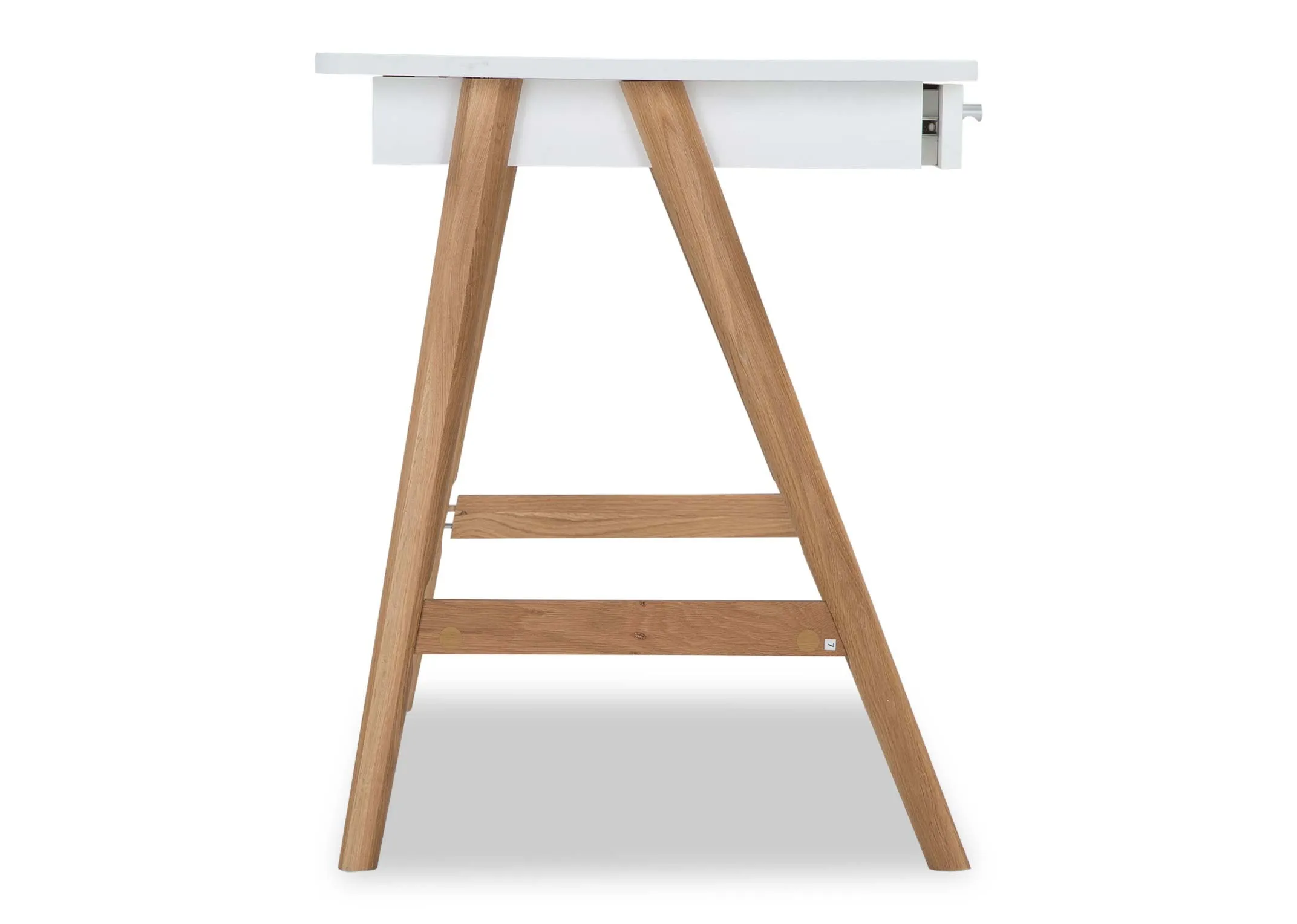 A view of the side of the white top Tia desk