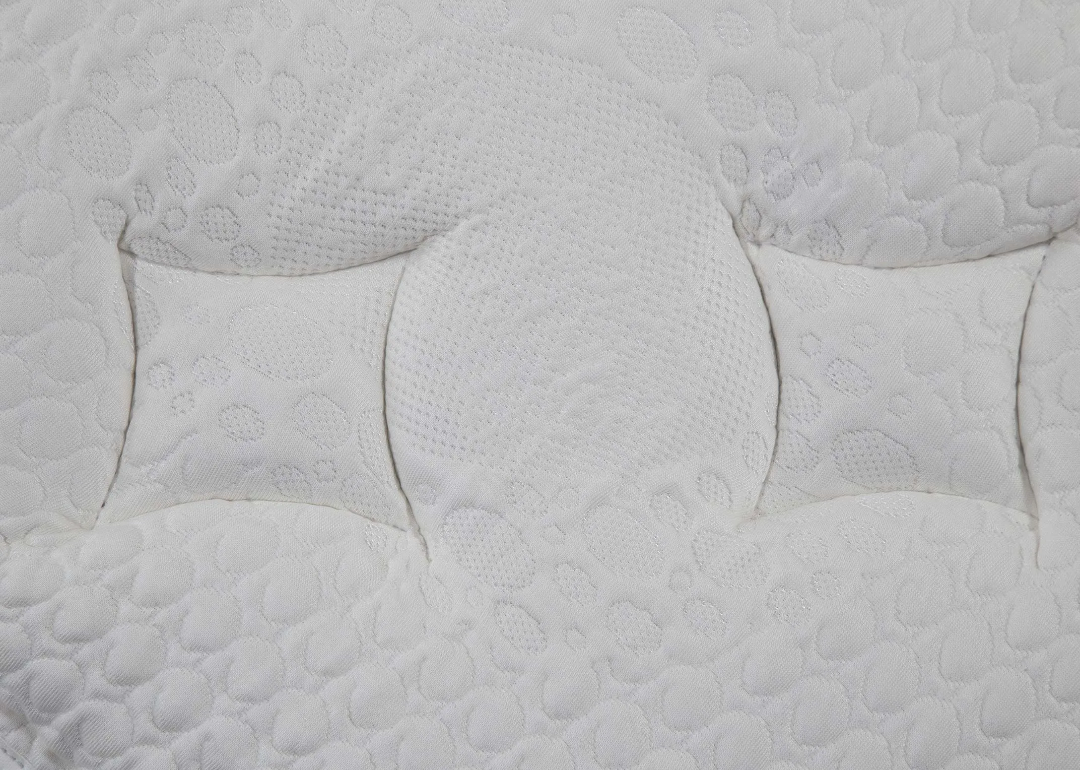 A view along the long side of the 6 ft Natural Comfort super king  roll up mattress