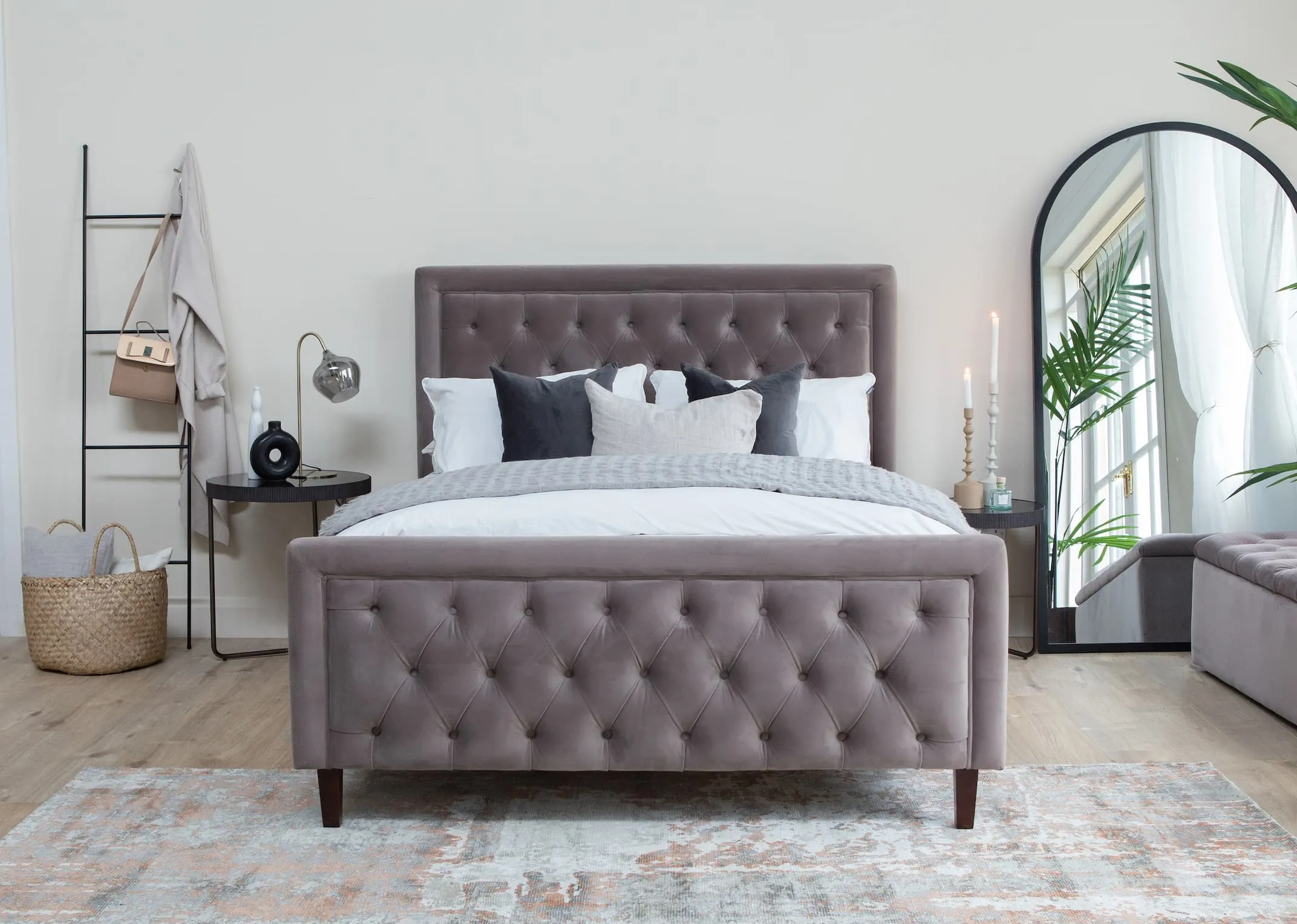 A 4ft6 taupe velvet Majestic bedframe with the Mandy side table & Chrisley mirror & Siem ladder.