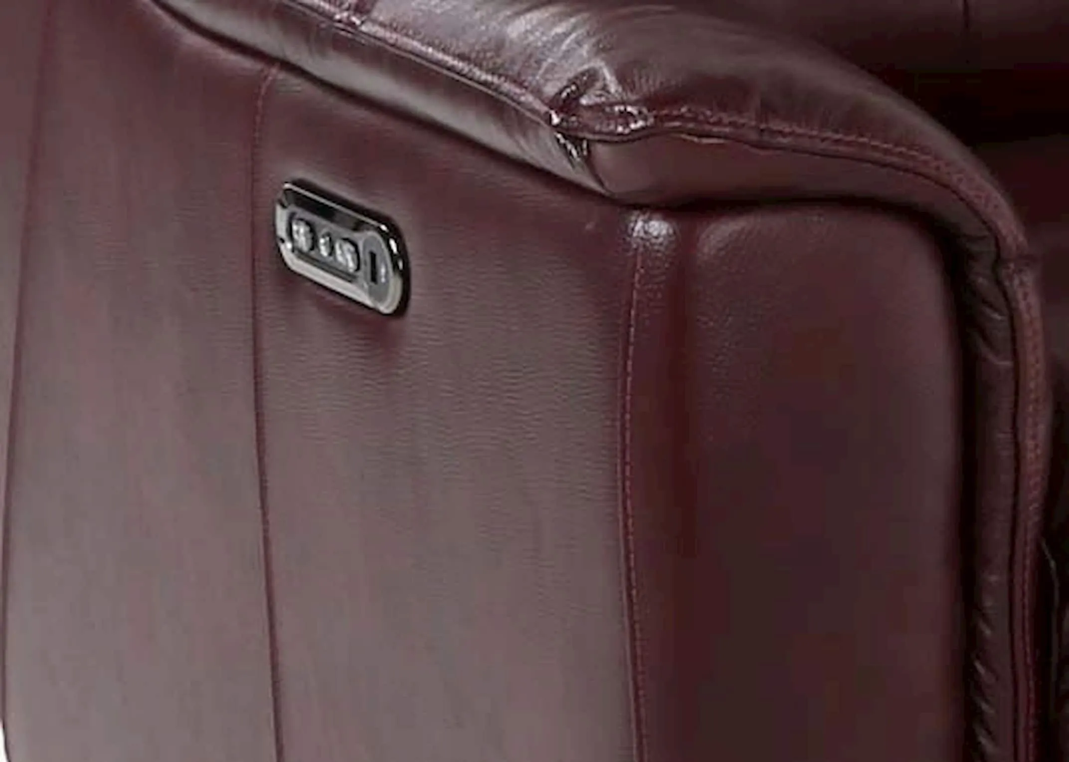 A deep red leather 2 seater power reclining sofa from EZ Living Furniture's Vantage range. Closeup of power fucntion