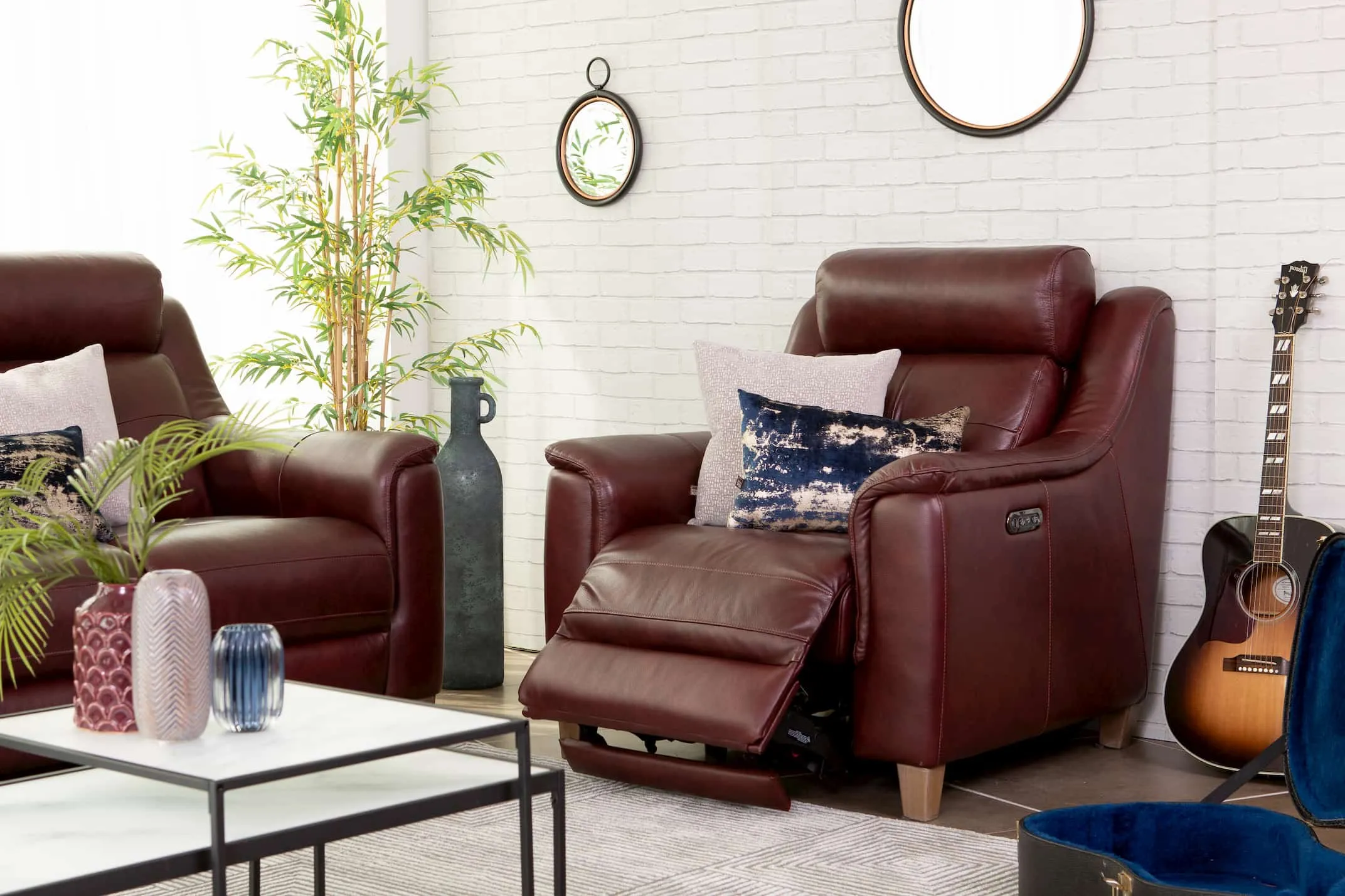 A lifestyle image of the Vantage Recliner with Bolton tables