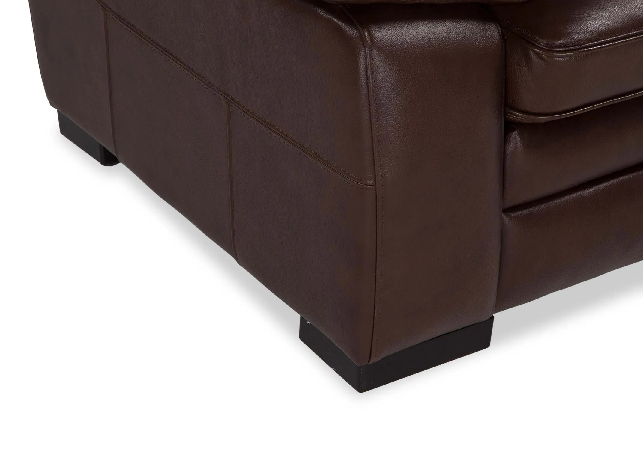 A close up image of the leg of the Apollo brown leather armchair.