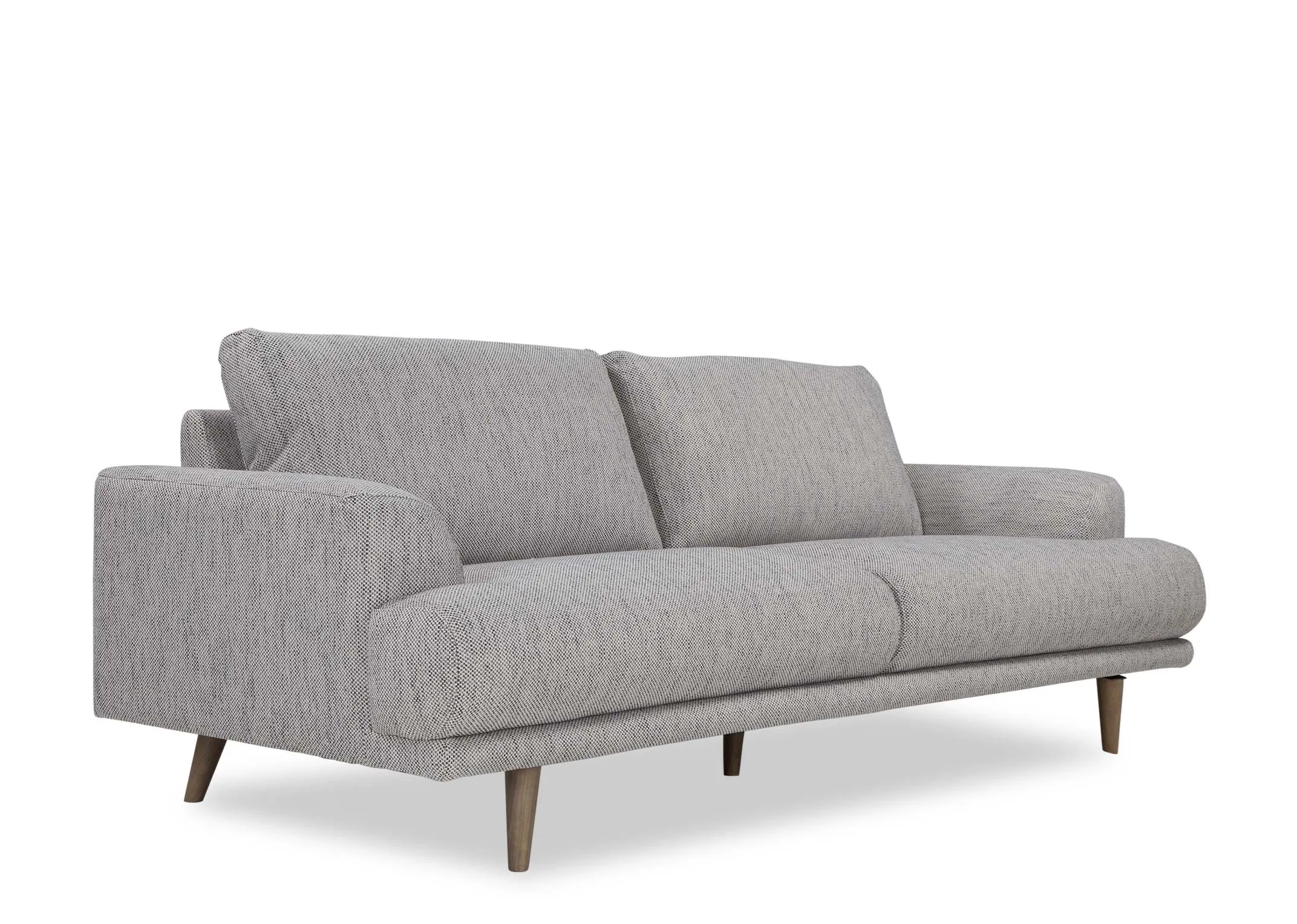 An angled shot from left to right of the Legend 3 seater sofa in grey fabric.