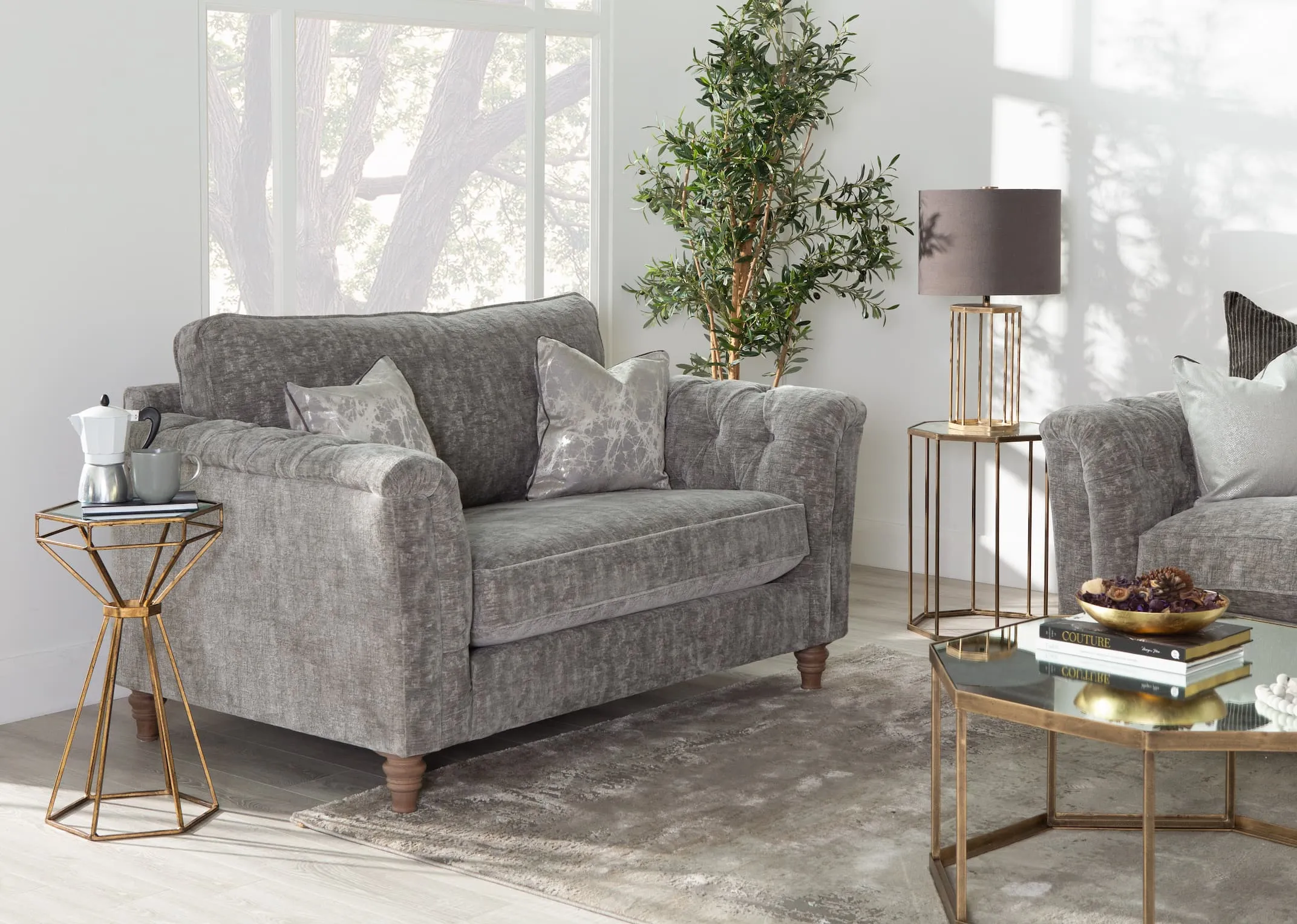 A distressed grey rug with ombre shapes from EZ Livings Kylo range. Closeup window on fabric and texture