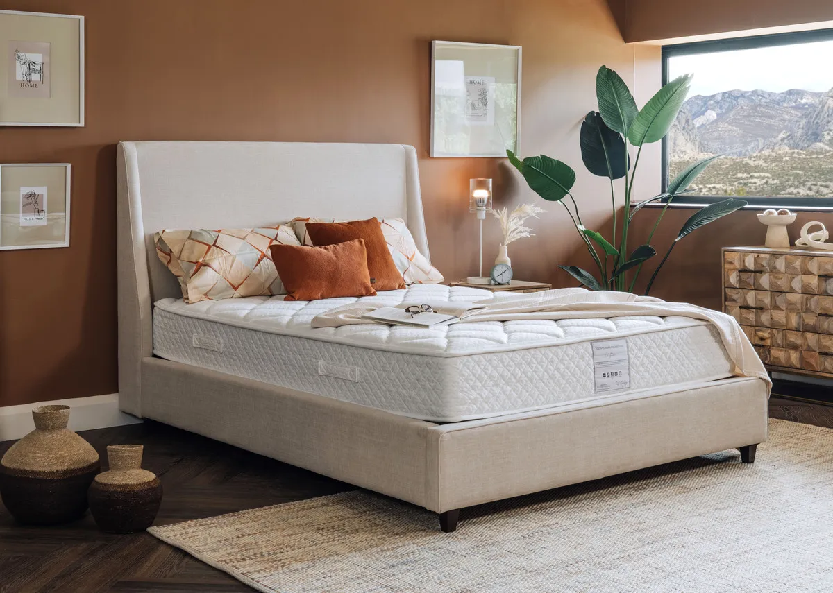 A lifestyle image of the Saoirse bed with the Clifden mattress and Diva chest.