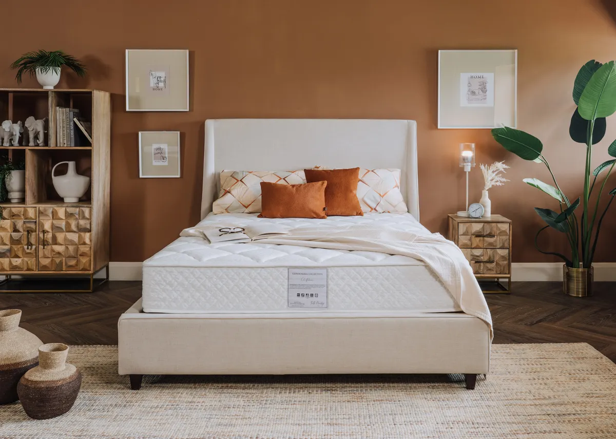 A lifestyle image of the Saoirse bed with the Clifden mattress and Diva chest.