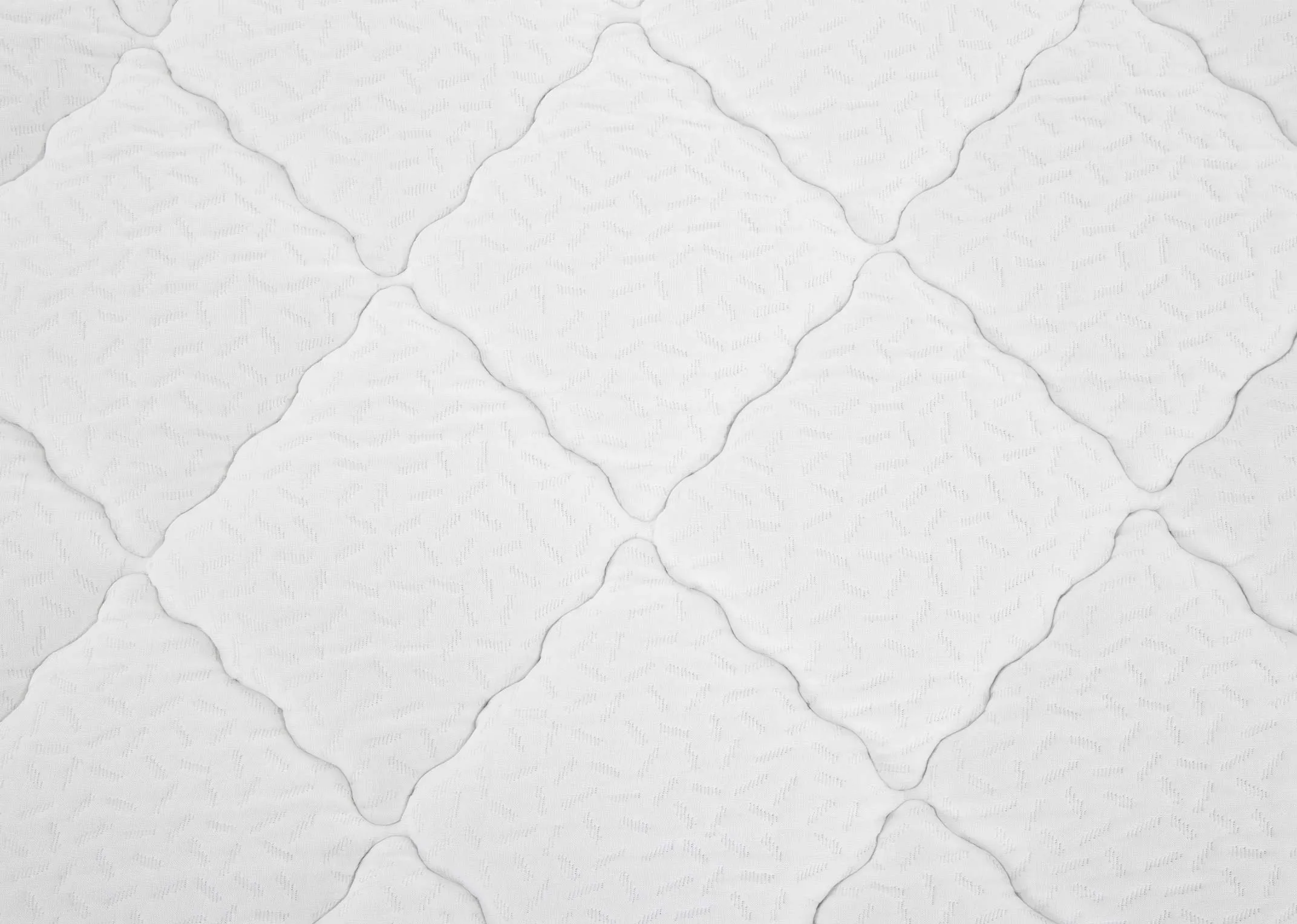 A close up view of the surface on the double 4ft6 Ortho 1000 mattress