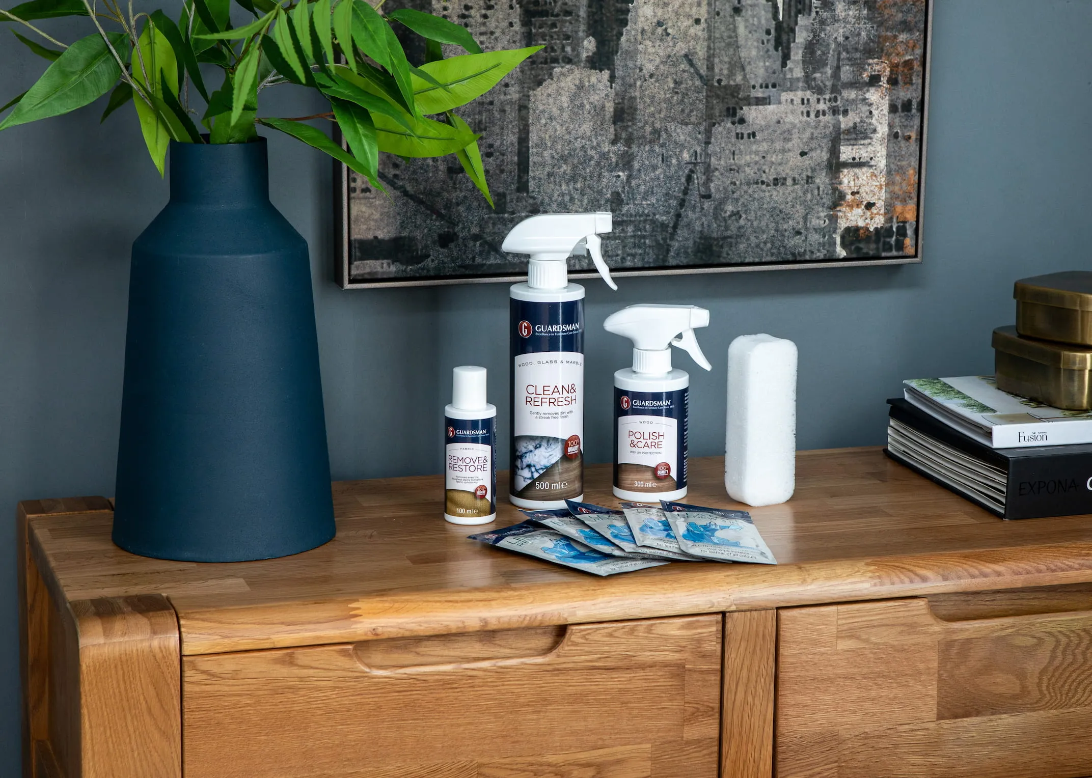 A lifestyle image of the Milton sideboard with the Dining Care Kit with New York Canvas