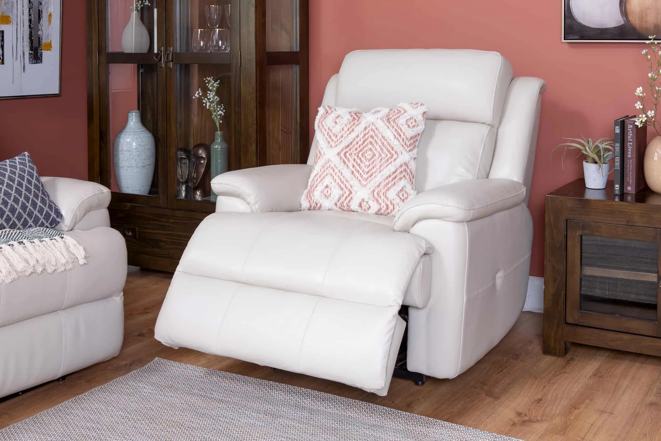 A lifestyle image of the Embrace Recliner with Montreal Display Unit & TV Unit with Inspire print