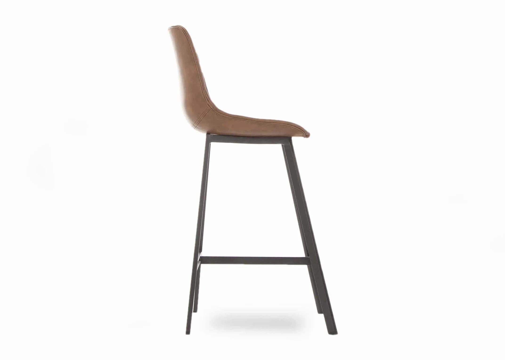 A bar stool with black metal legs & tan faux leather seat with back from EZ Living Furniture's Leo range. Side view foot rung