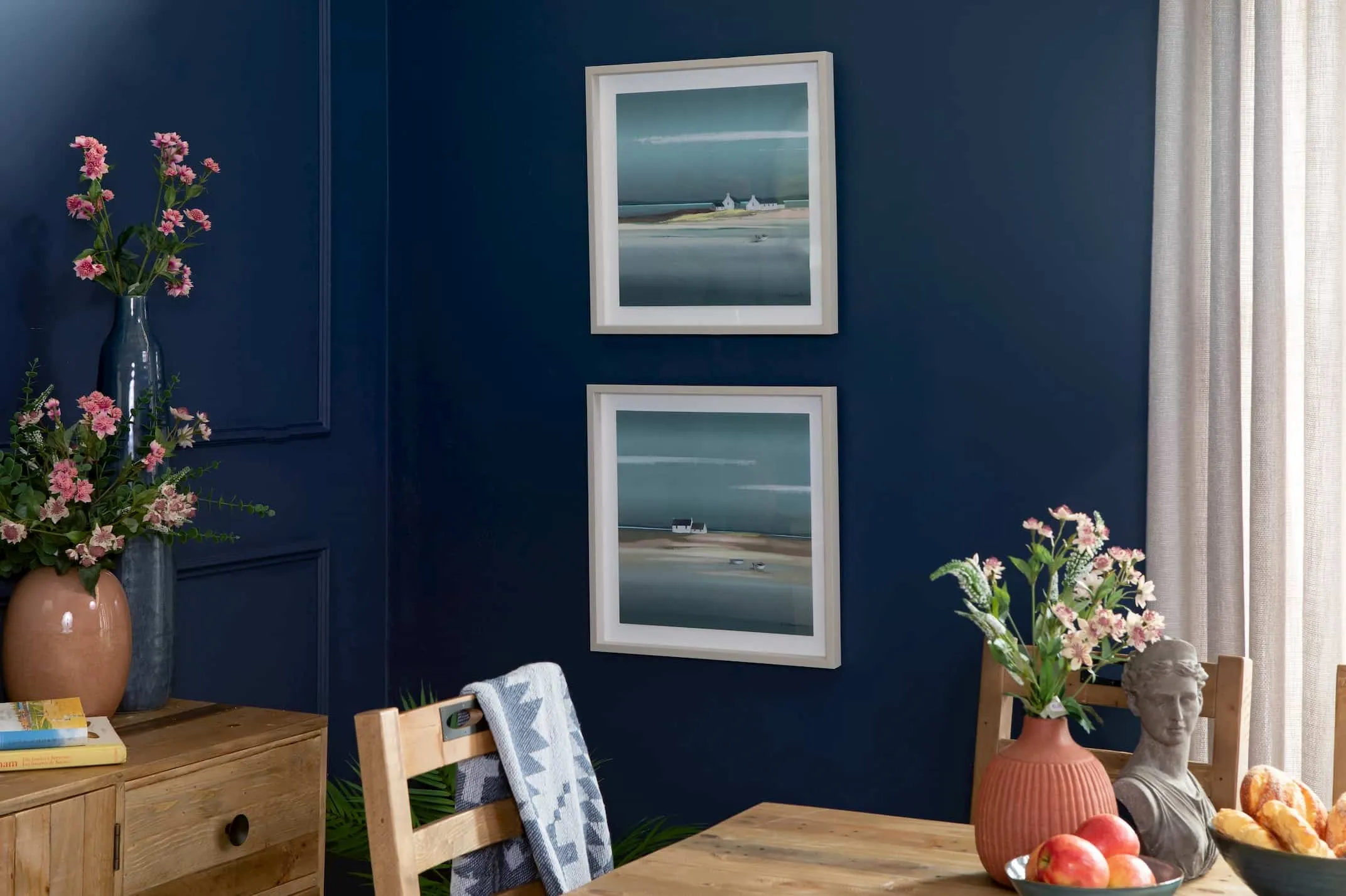 A lifestyle image of the Sapphire & Azure Prints from Ulyana Hammond with the San Francisco Dining Range.