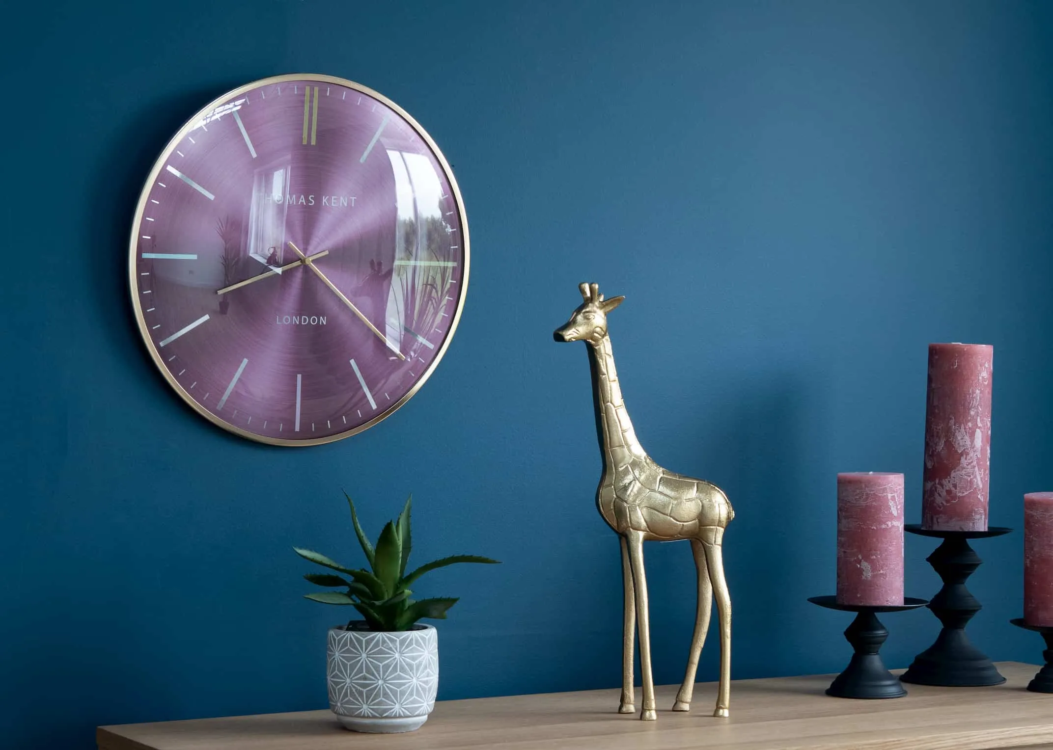 A lifestyle image of the Ruby Medium Wall Clock teamed with Alaska Furniture available at EZ Living Furniture