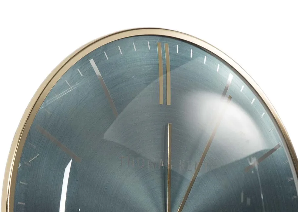 The medium teal oyster wall clock from the Thomas Kent collection at EZ Living Furniture - top view