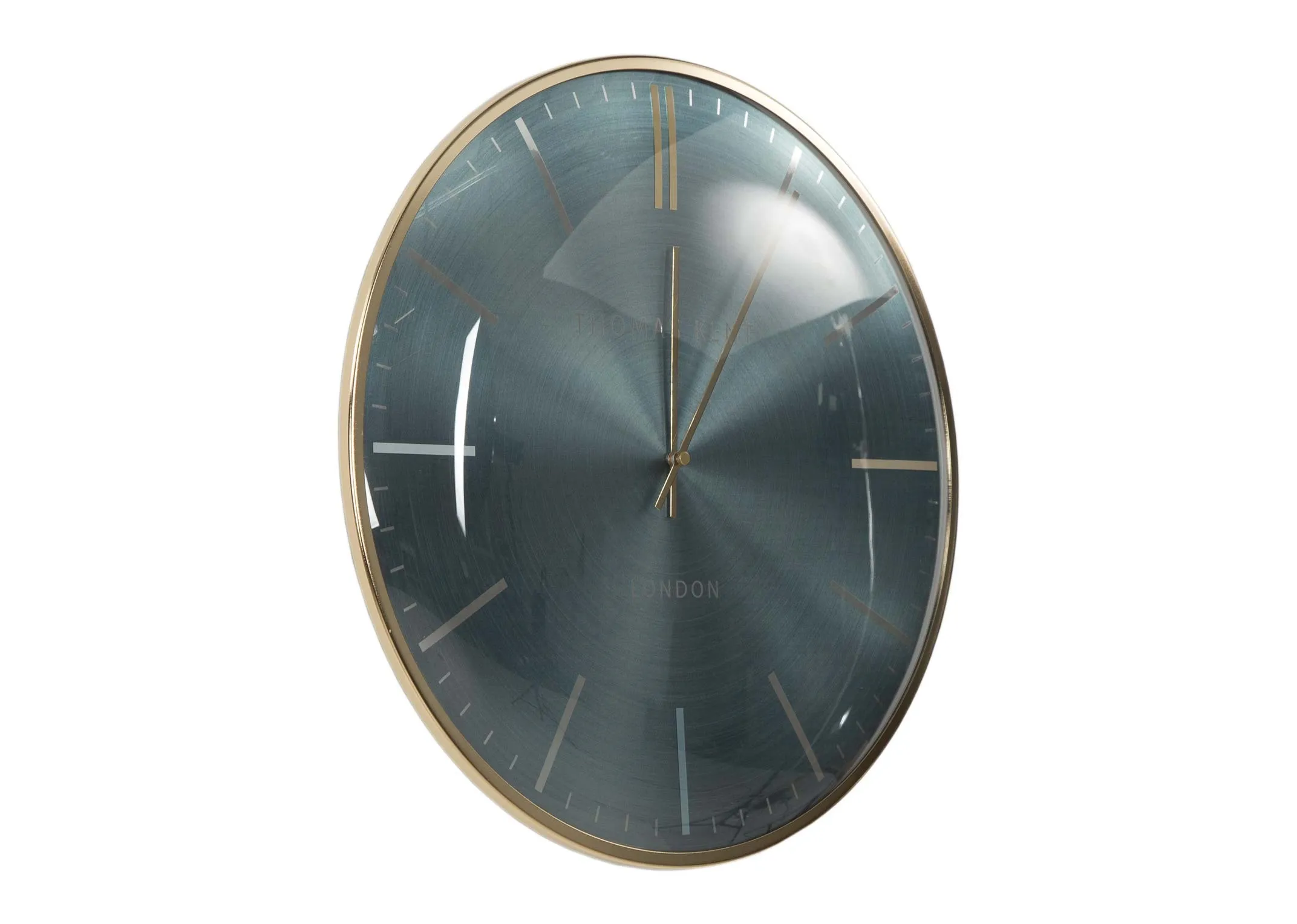 The medium teal oyster wall clock from the Thomas Kent collection at EZ Living Furniture - angle view