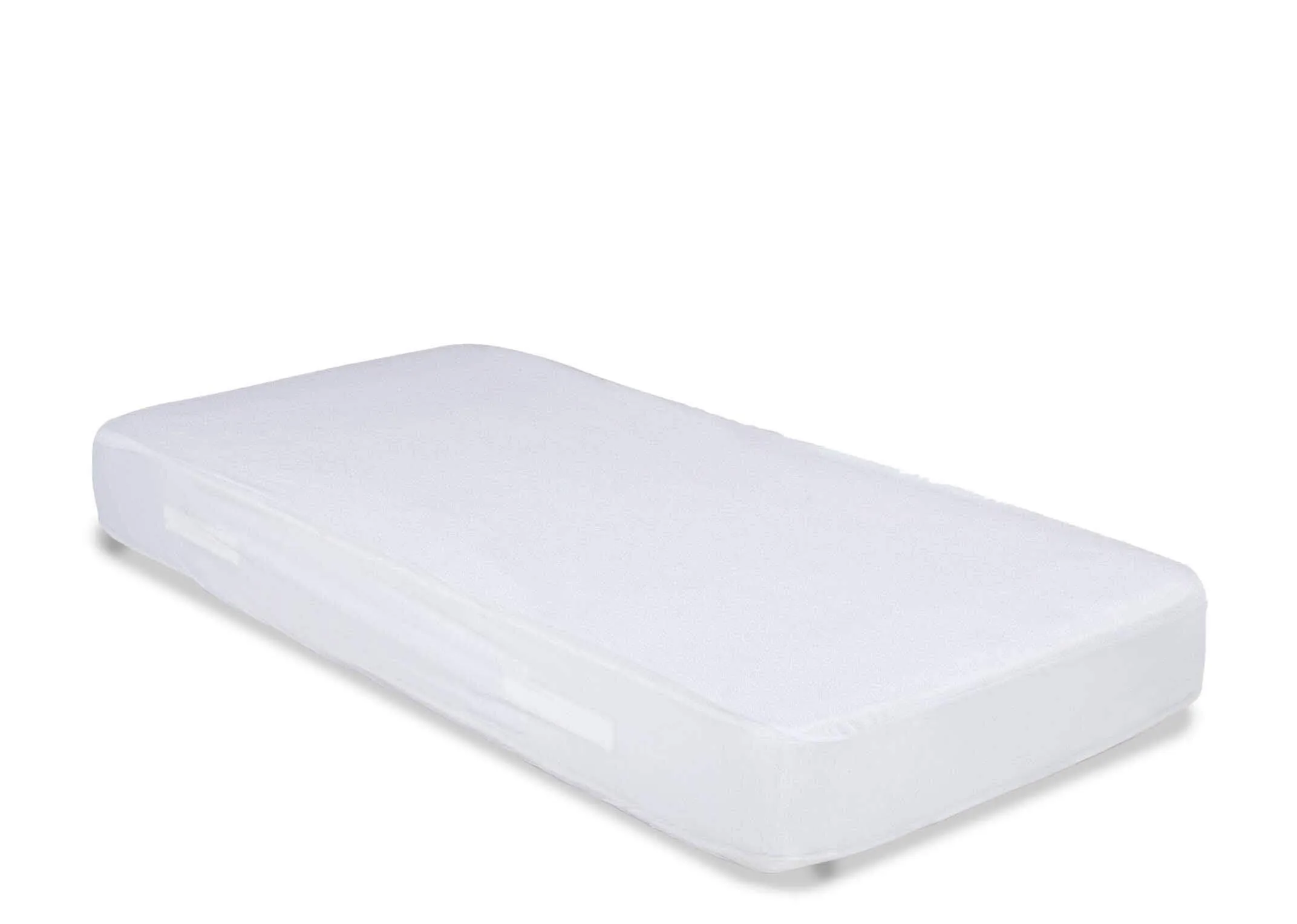 The Guardsman King Size 5ft mattress protector fitted on a mattress. Angled view.