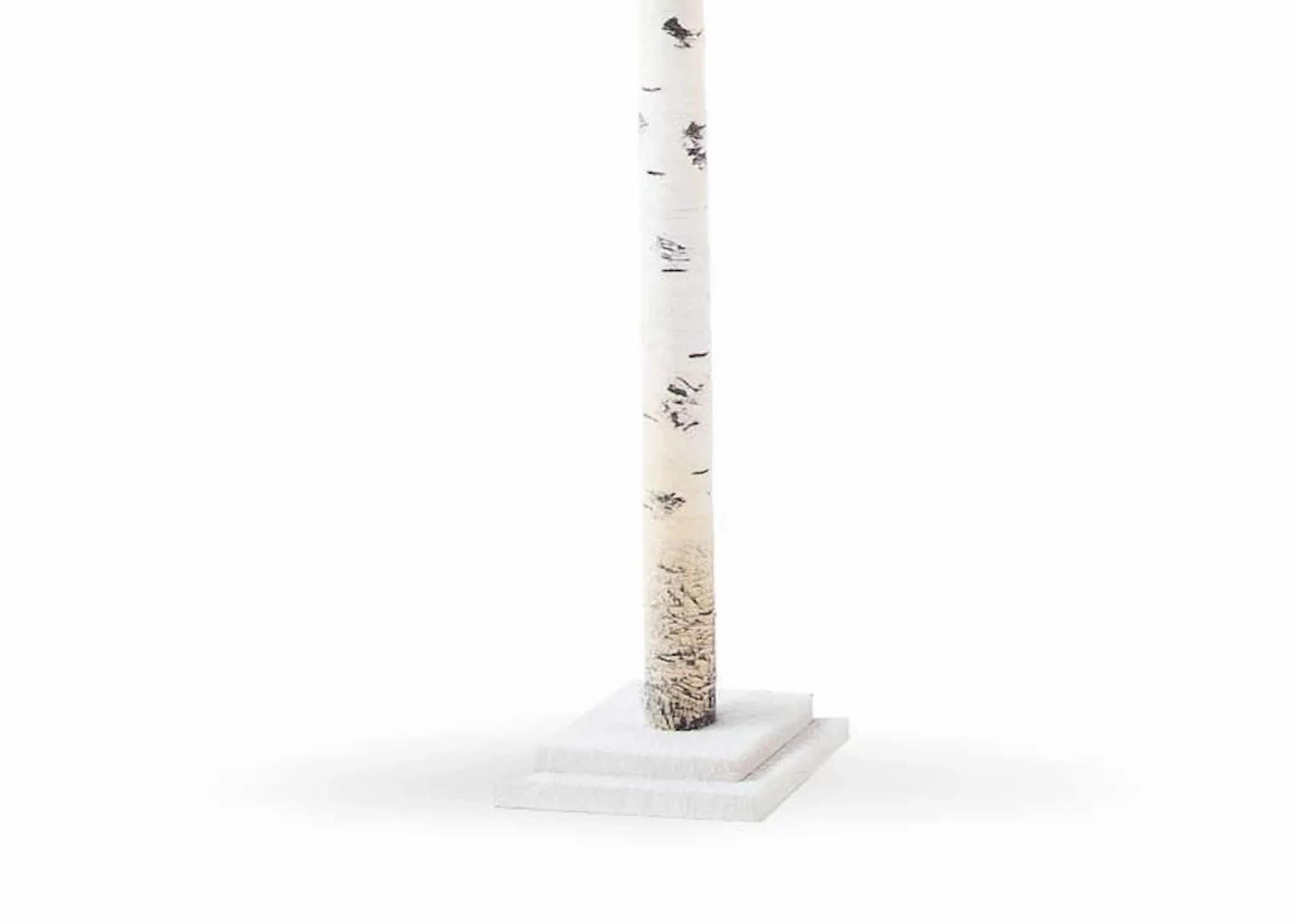 A small birch decorative tree on stand with 300 led lights from EZ Living Furnitures Christmas range. Closeup of white base