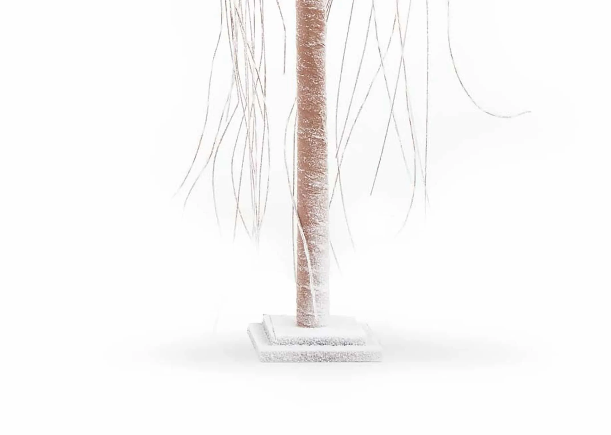 A decorative willow tree with 300 LED lights from EZ Living Furniture's Christmas trees. Closeup of branches lights off