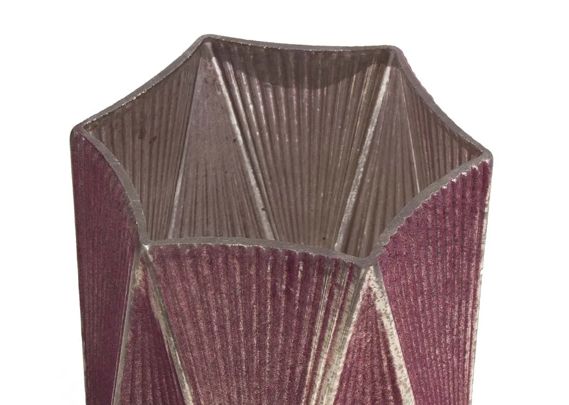 A red glass geometric shape candle holder from EZ Living Furniture's Christmas range. Closeup of design & interiors