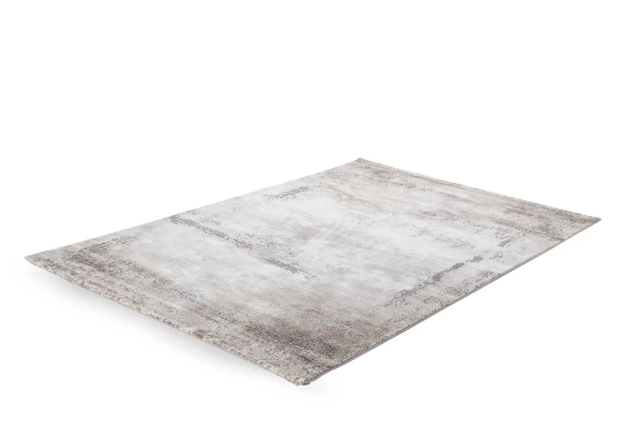 A grey ombre rug in Small from EZ Living Furniture's Kylo range. Angled view of rug